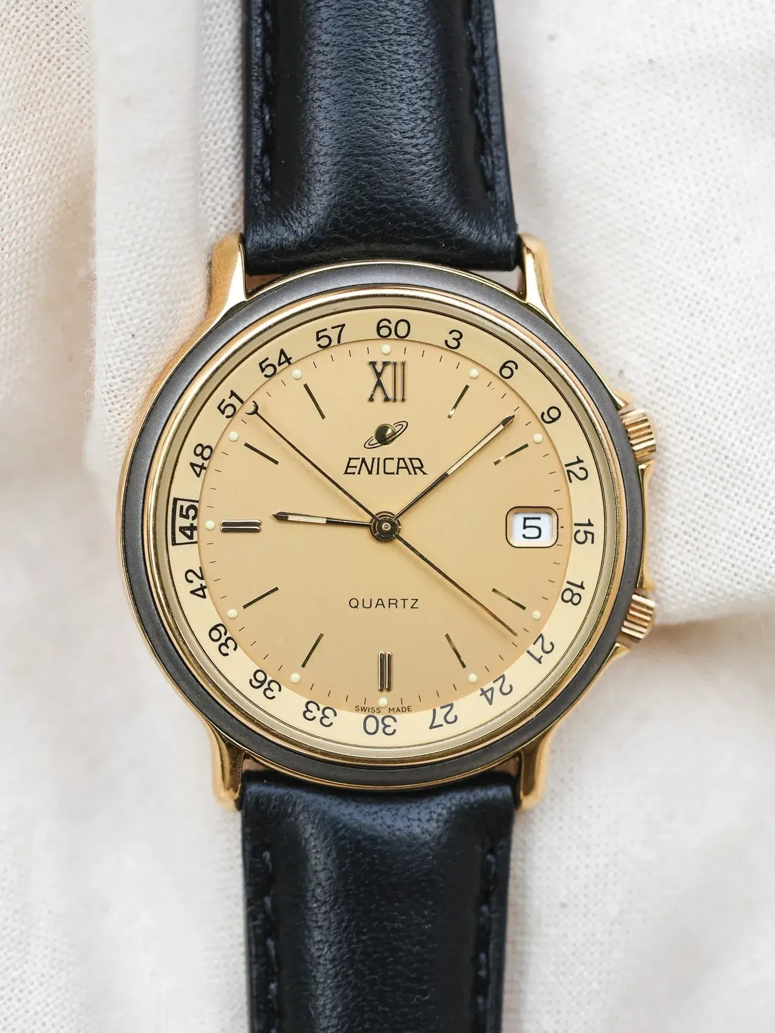 Enicar - Gold Plated internal directional bezel - NOS - 1990s