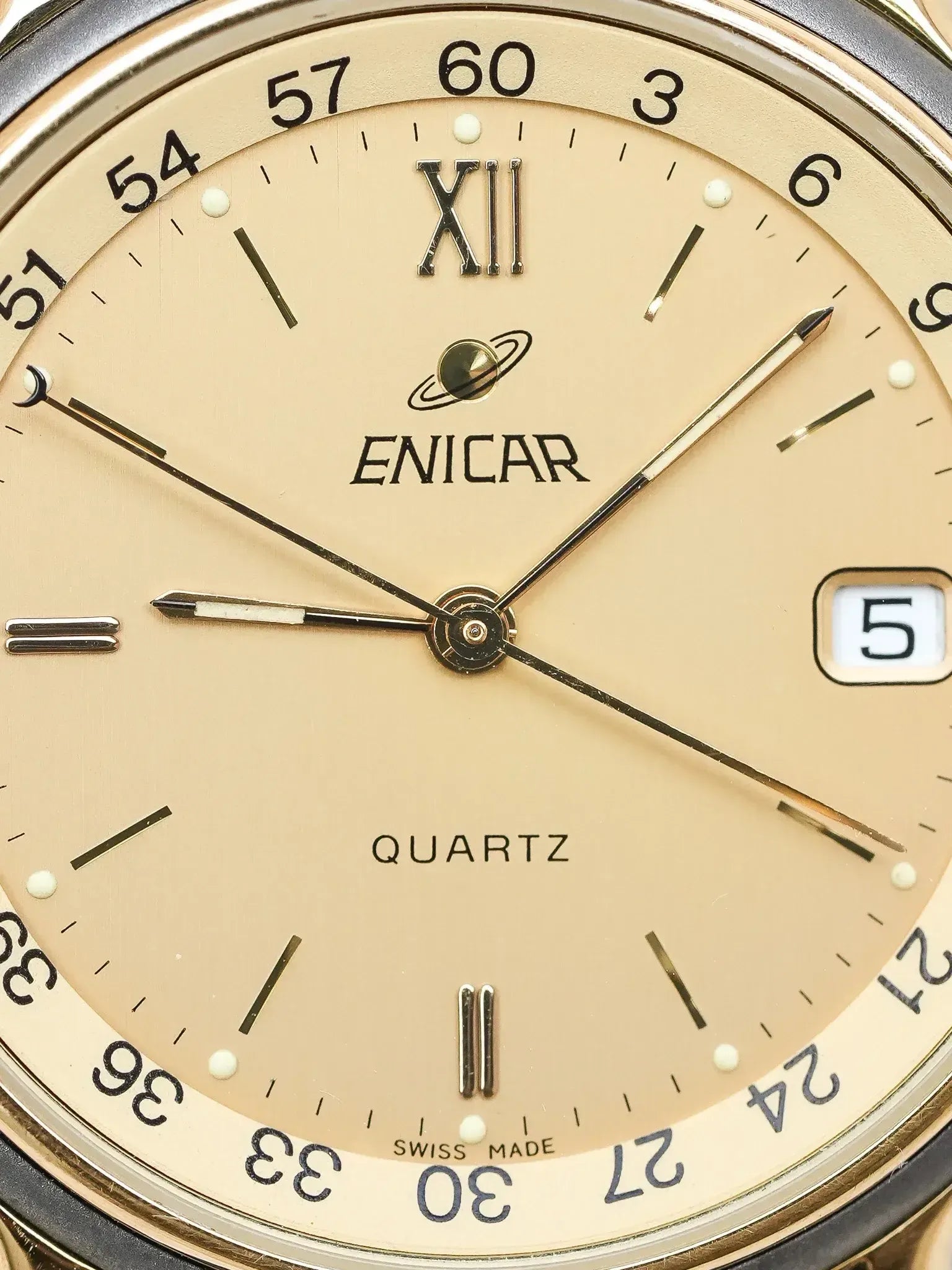 Enicar - Gold Plated internal directional bezel - NOS - 1990s 