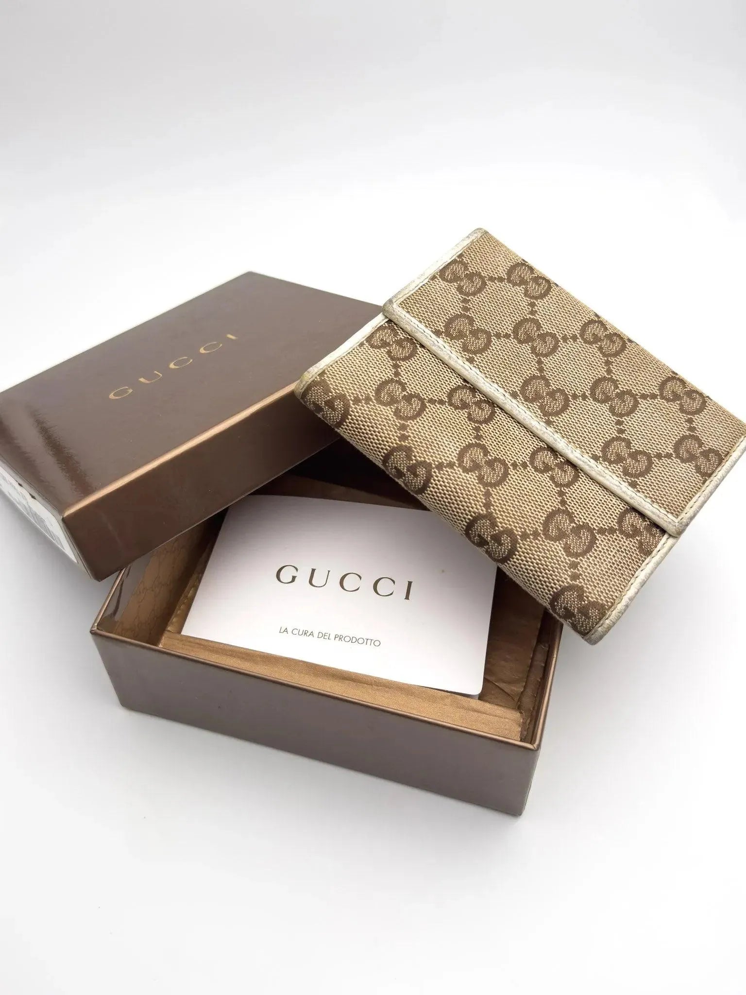 Gucci - Portefeuille en toile GG cuir blanc - Atelier Victor Paris - Vintage Watch Shop Dubai