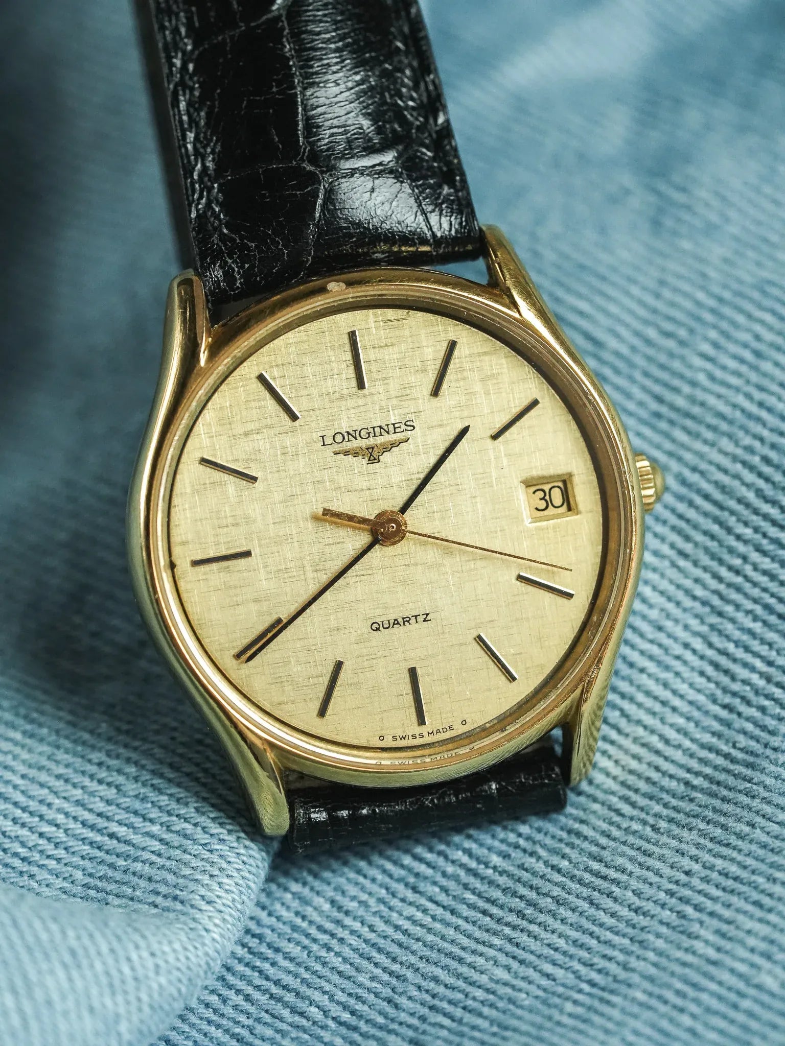 Longines - Cadran lin date plaqué or index onyx - 1980s - Atelier Victor