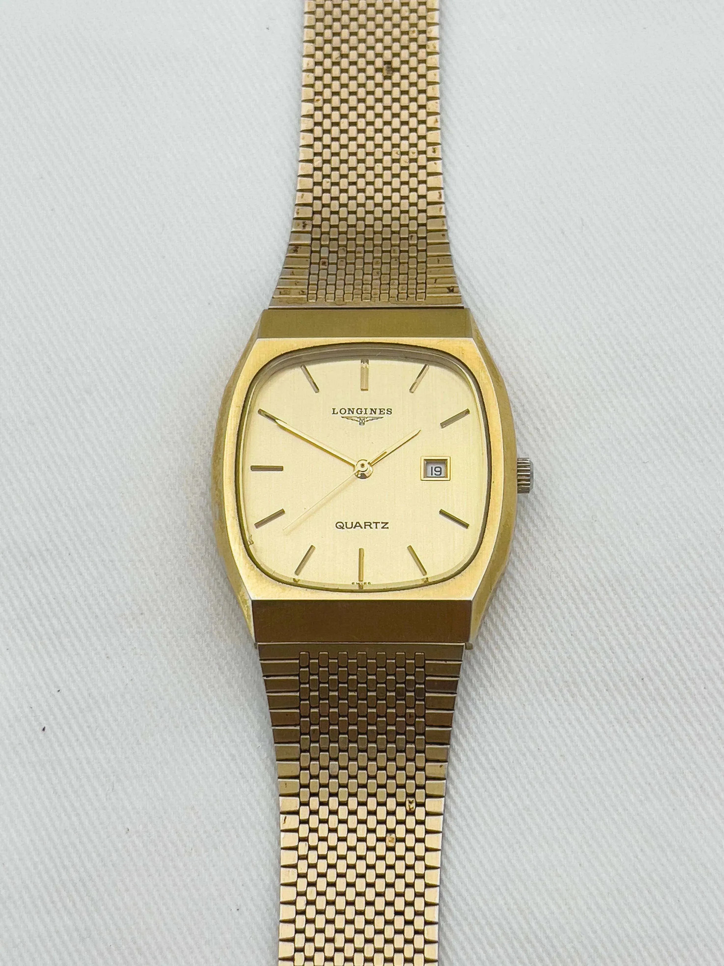 Longines - Full Gold Date Quartz - 1980s - Atelier Victor Paris - Vintage Watch Shop Dubai