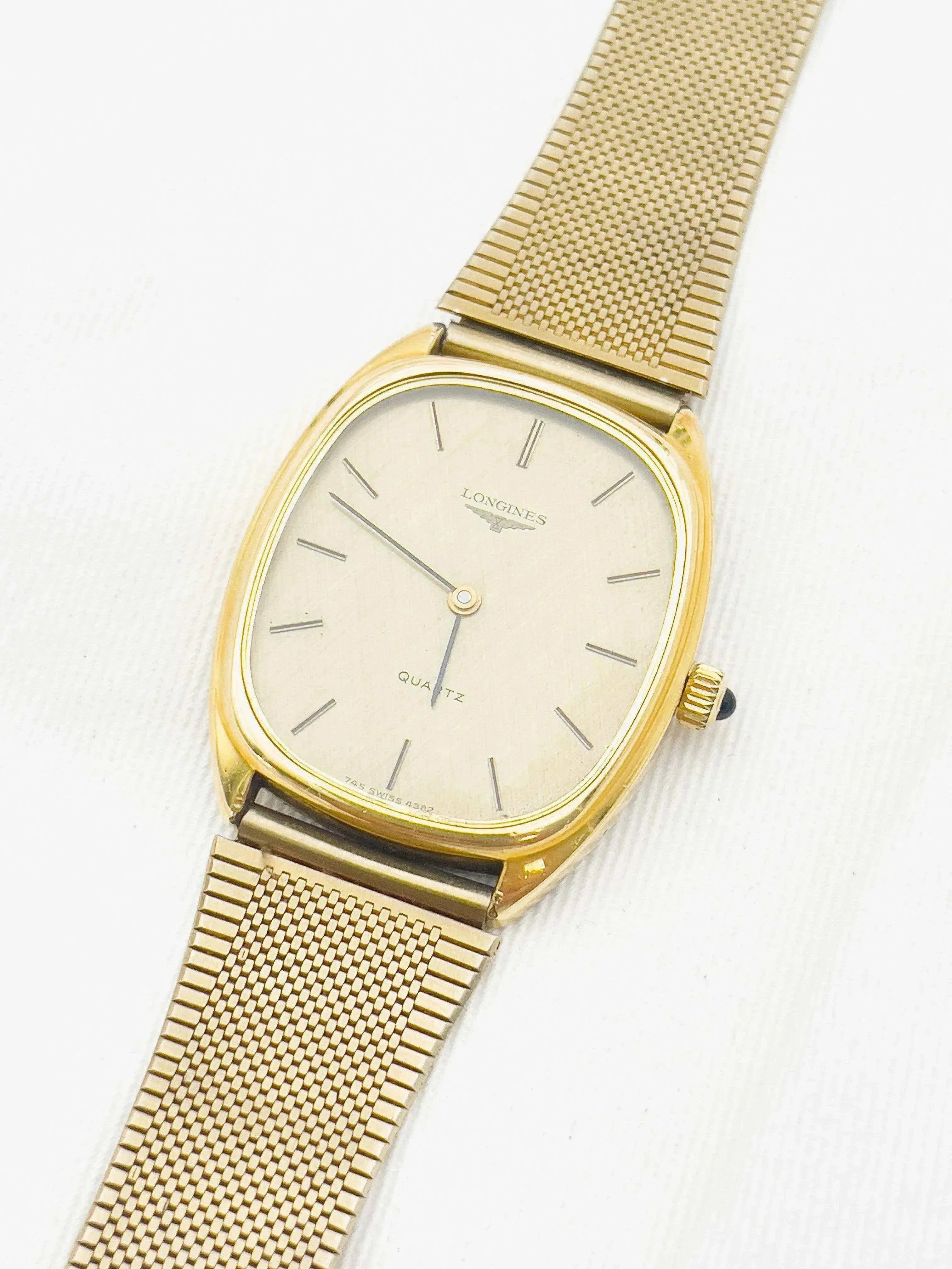 Longines - Gold Cabochon Tonneau quartz - 1980s - Atelier Victor - Vintage  Shop