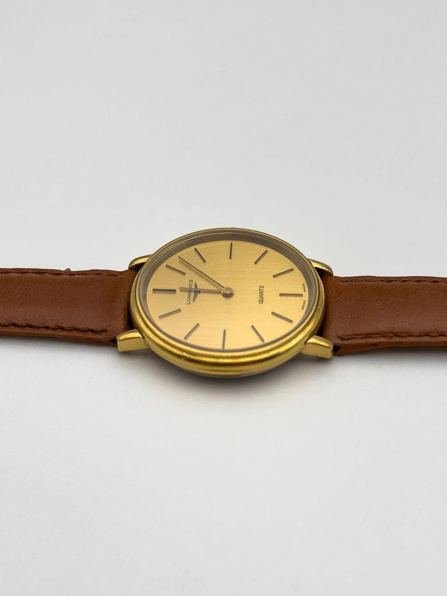 Longines - Gold Circle Blue Cabochon - 1970s - Atelier Victor Paris - Vintage Watch Shop Dubai