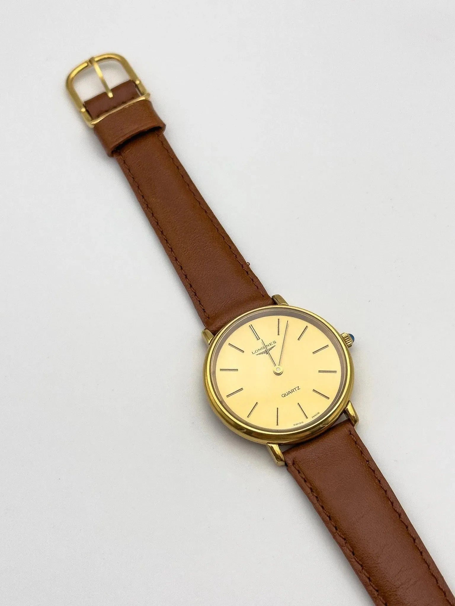 Longines - Gold Circle Blue Cabochon - 1970s - Atelier Victor Paris - Vintage Watch Shop Dubai