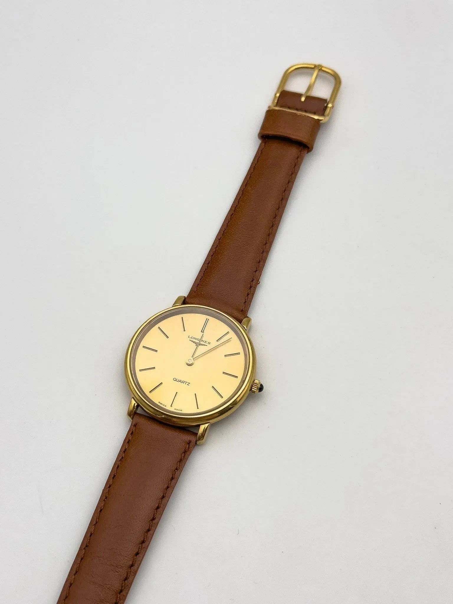 Longines - Gold Circle Blue Cabochon - 1970s - Atelier Victor Paris - Vintage Watch Shop Dubai