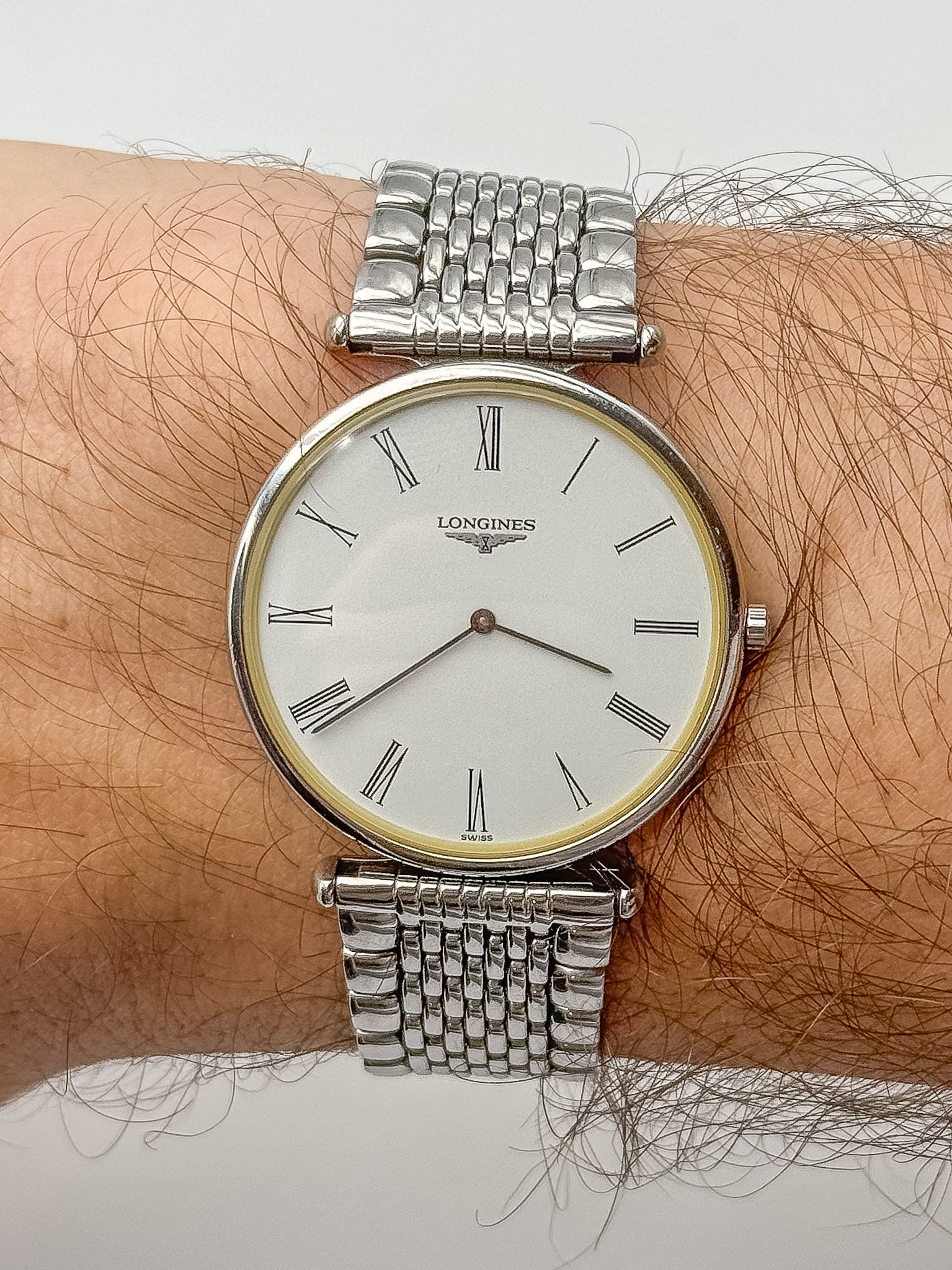 Longines - La Grande Classique Extra Plat acier maille cadran blanc - 1990s - Atelier Victor Paris - Vintage Watch Shop Dubai