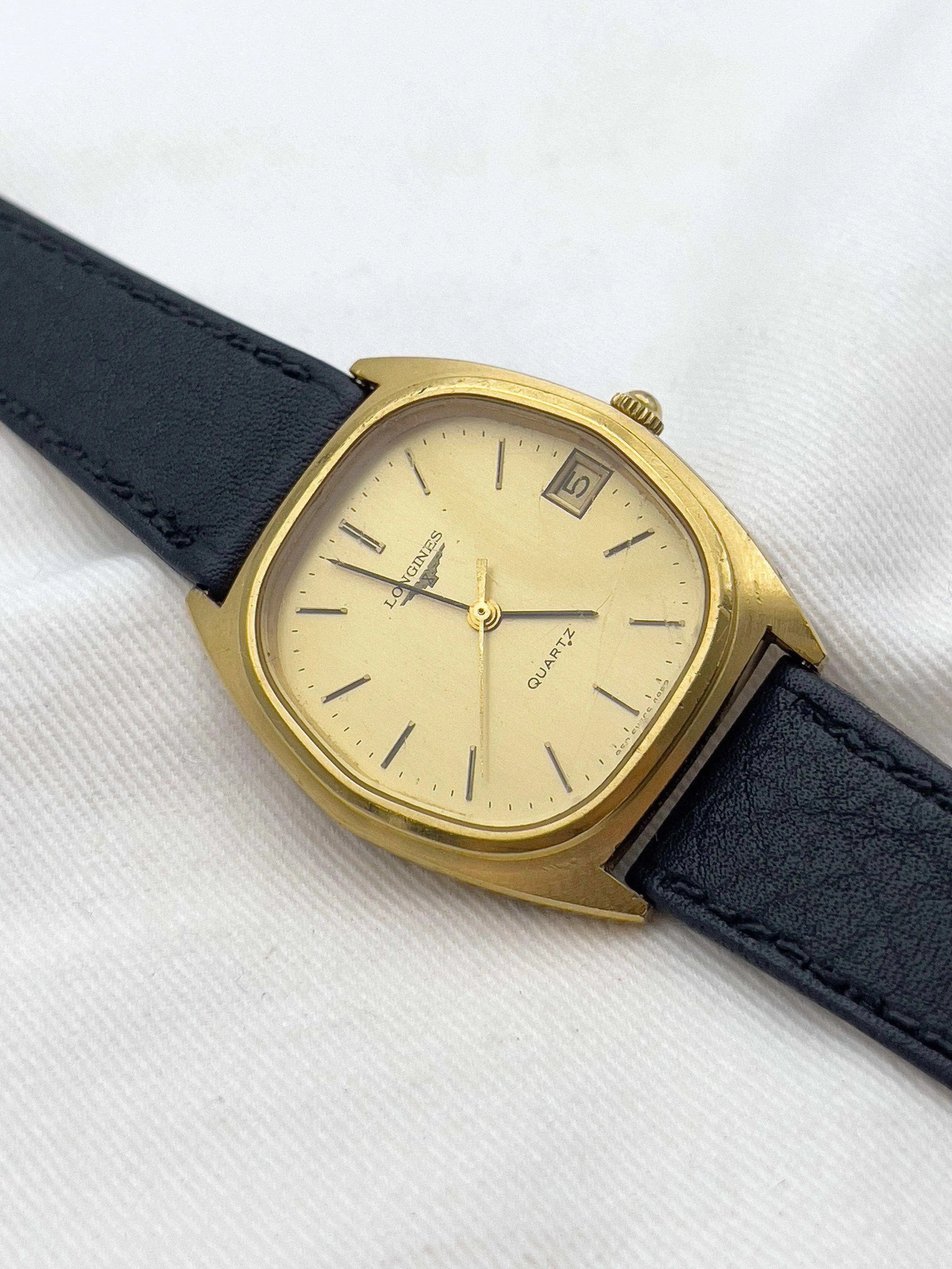 Longines - Plaqué or date Tonneau - 1979 - Atelier Victor Paris - Vintage Watch Shop Dubai
