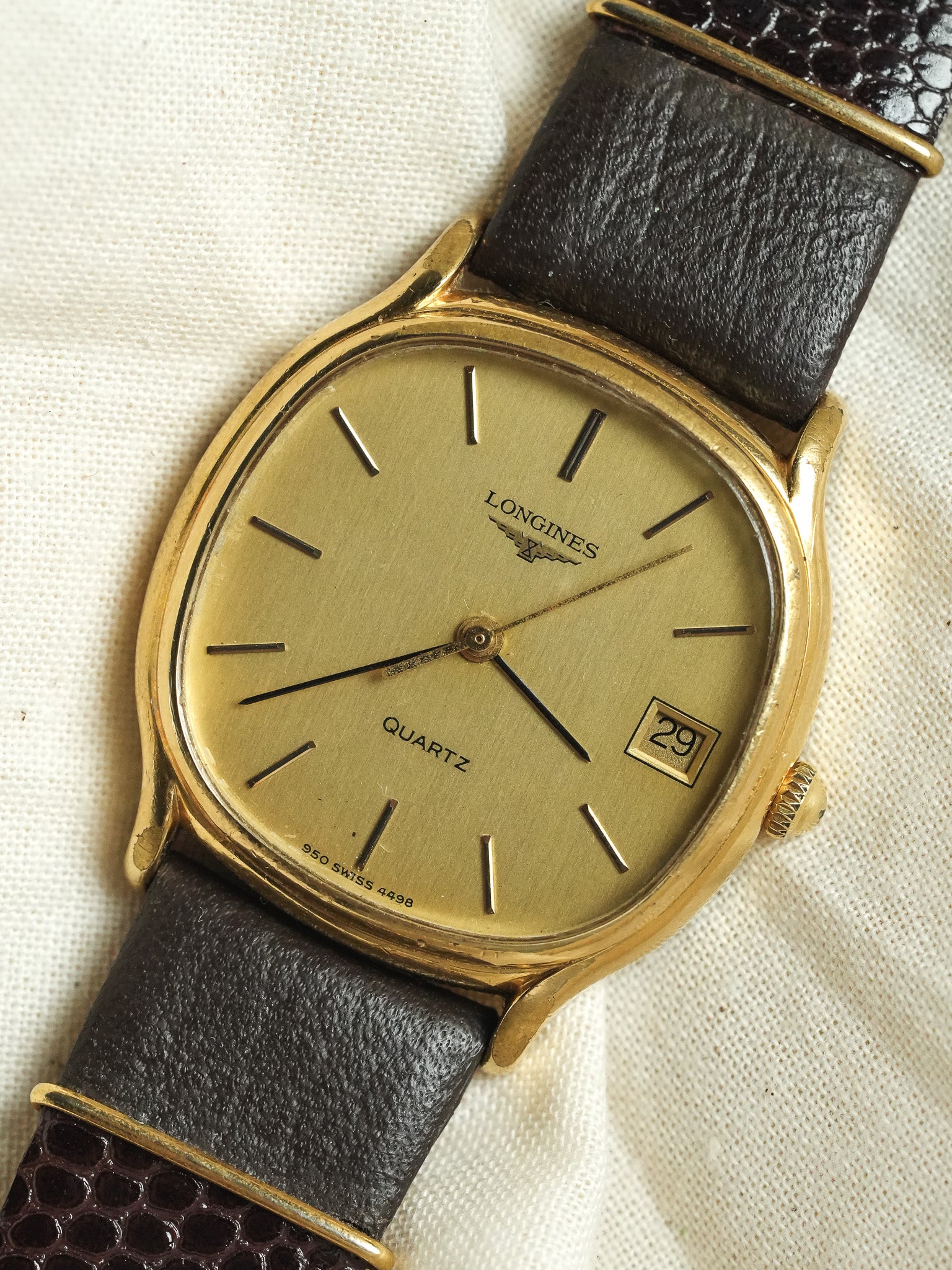 Longines - Tonneau Plaqué Or date Quartz - 1980s - Atelier Victor - Vintage  Shop