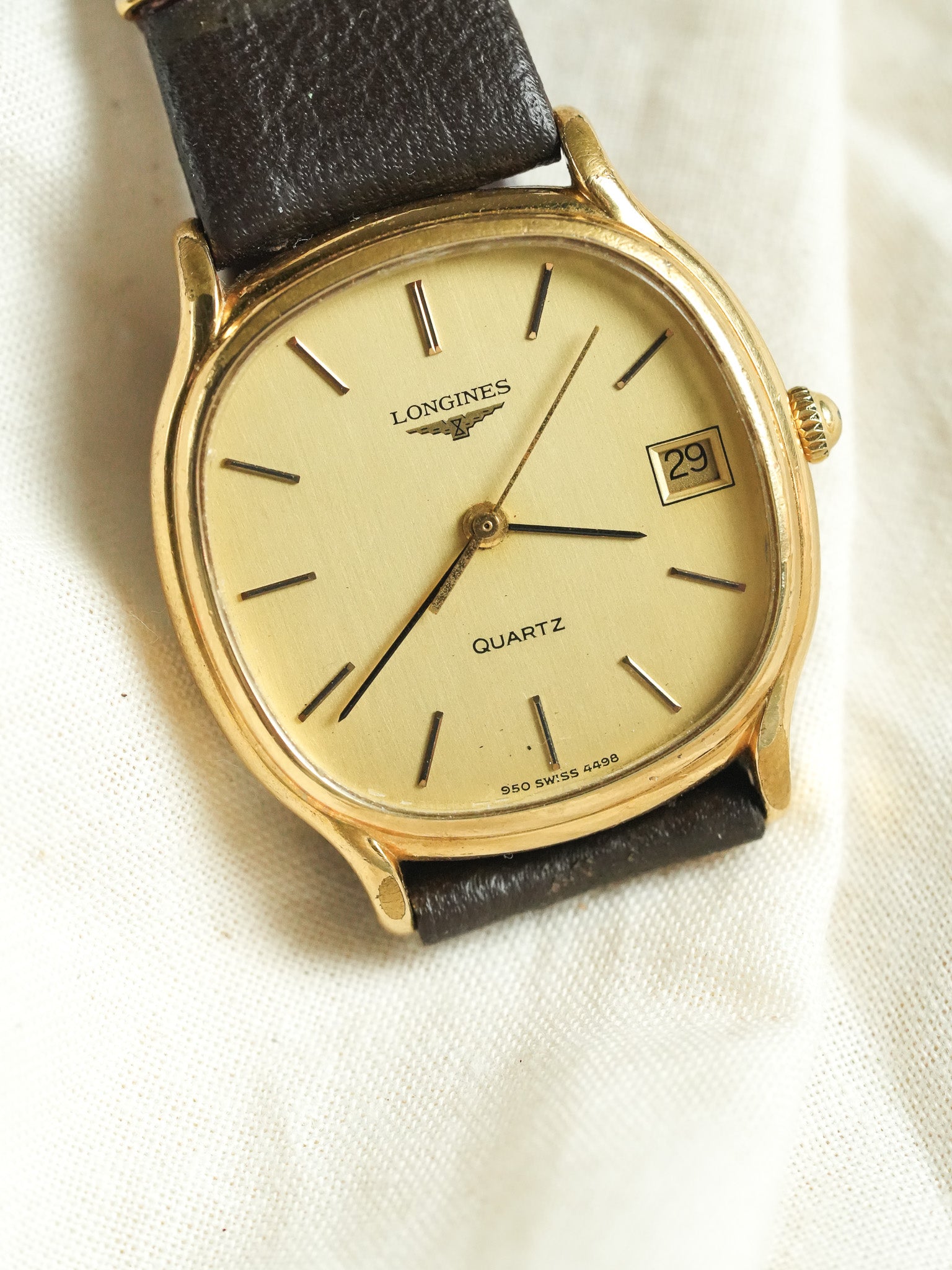 Longines - Tonneau Plaqué Or date Quartz - 1980s - Atelier Victor - Vintage  Shop