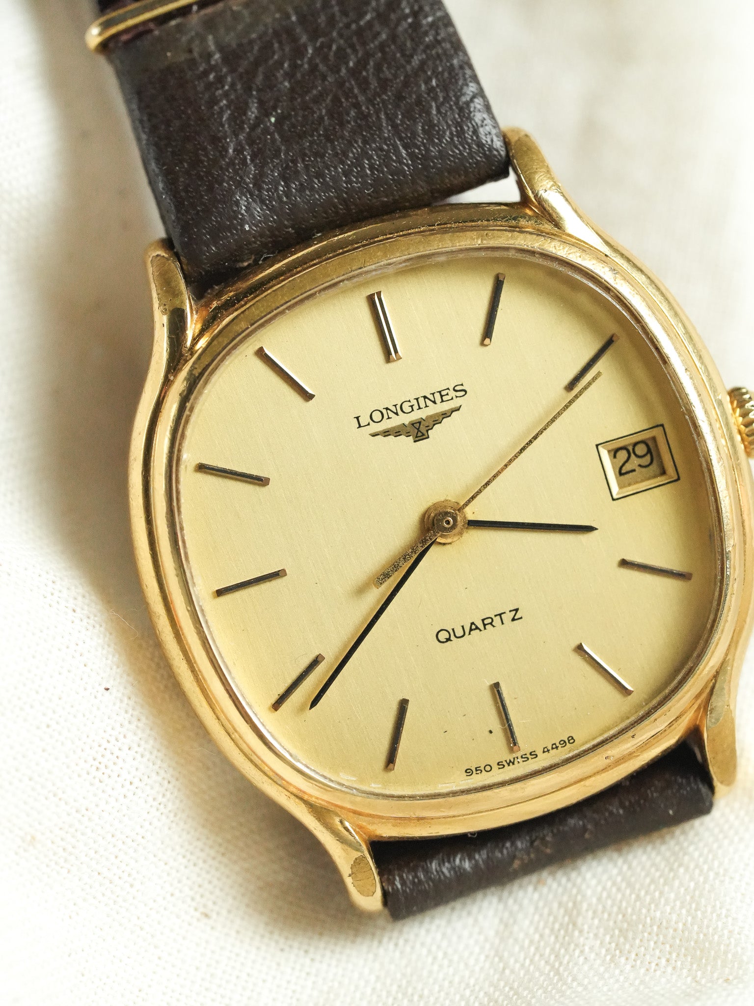 Longines - Tonneau Plaqué Or date Quartz - 1980s - Atelier Victor - Vintage  Shop