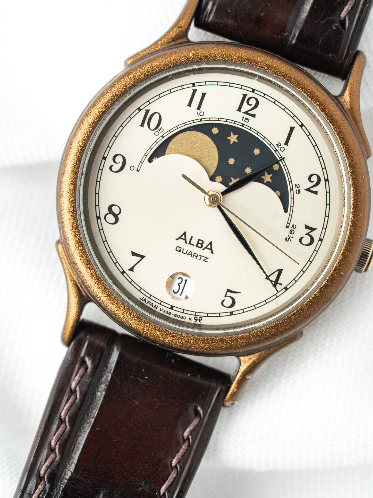 Alba Quartz vintage watch with moon phase, gold case, white dial, brown leather strap