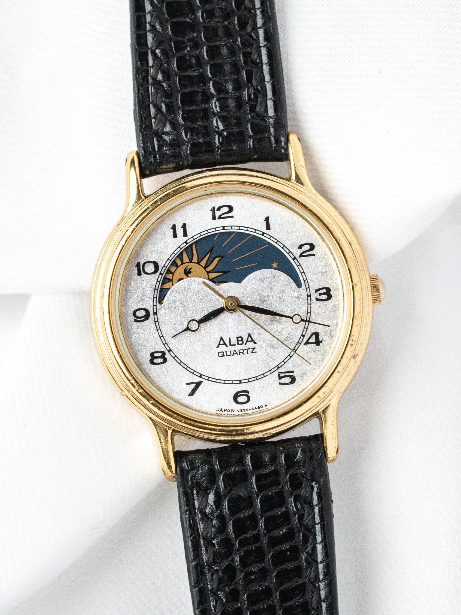 Reloj Alba Soleil-Lune V535-6B10 — Esfera plateada escarchada (1989) 