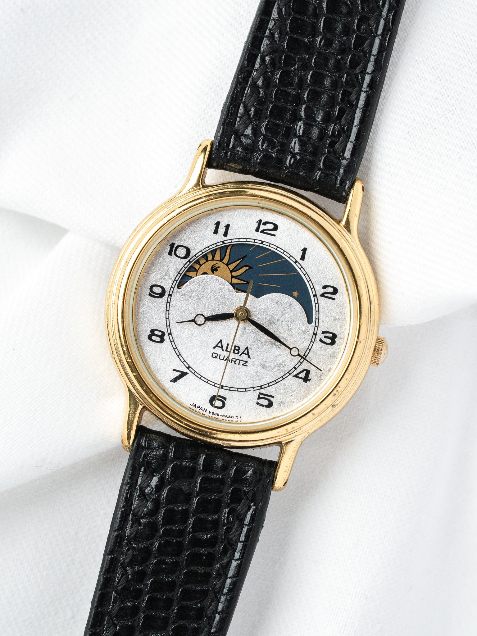 Reloj Alba Soleil-Lune V535-6B10 — Esfera plateada escarchada (1989) 