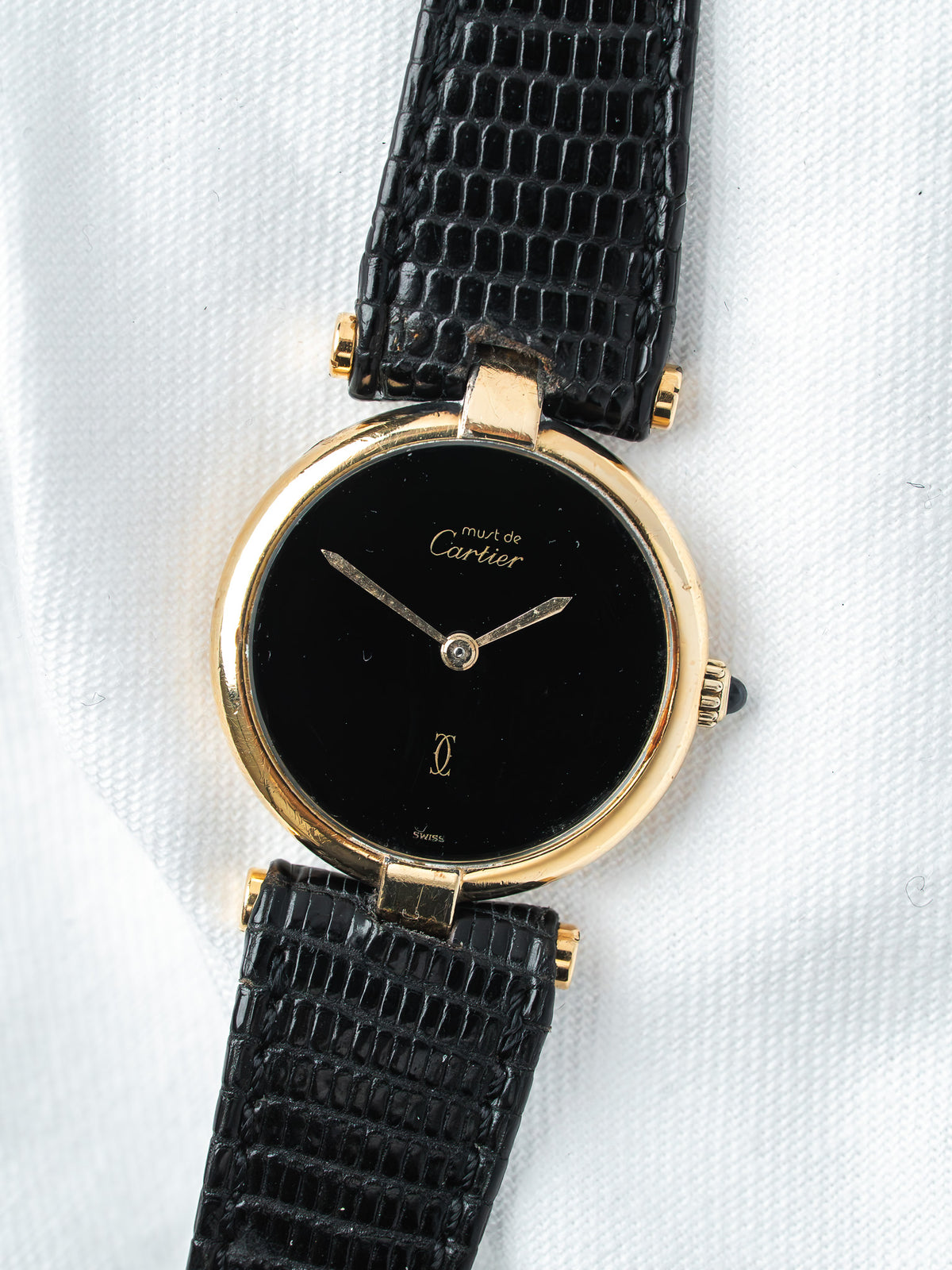 Cartier Must de Cartier vintage watch with black dial and gold case