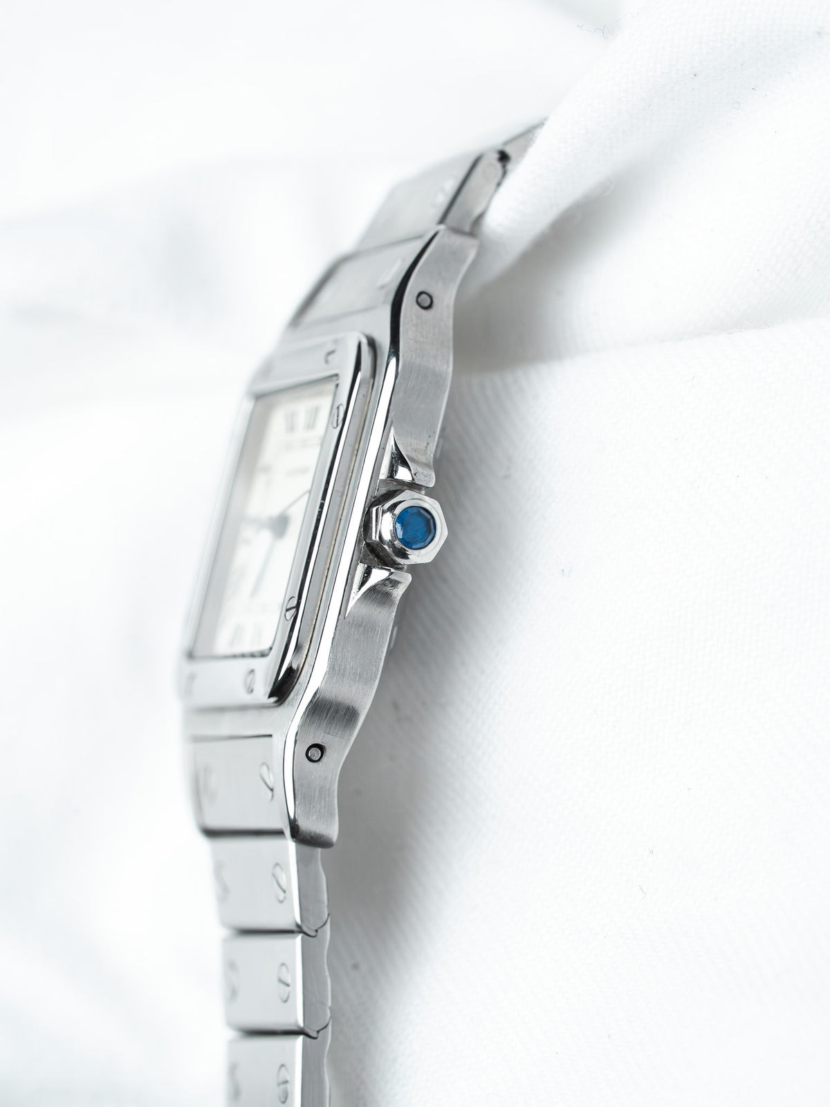 Cartier Santos vintage watch with steel case, blue crown, white dial