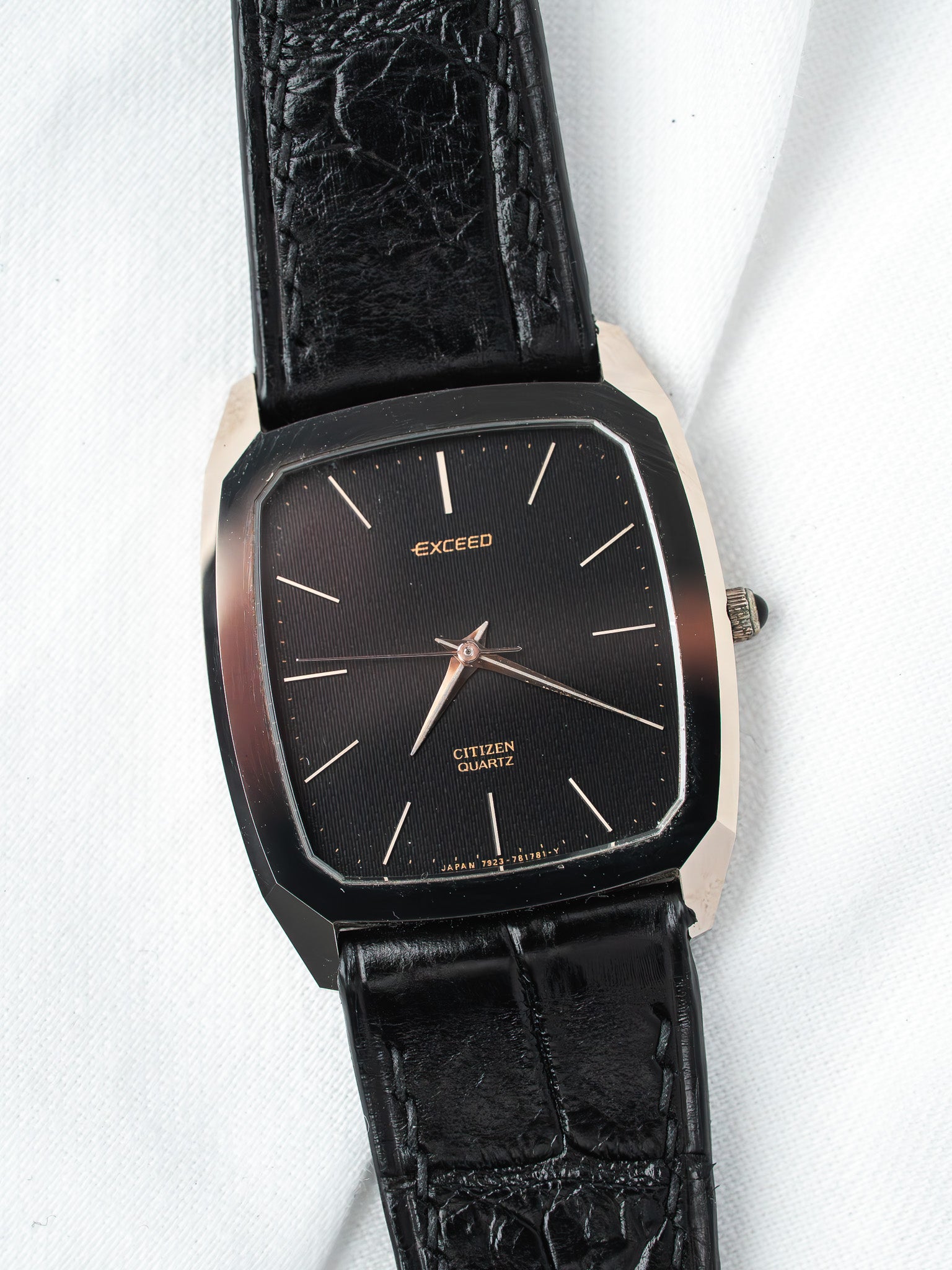 Citizen Exceed vintage watch with black dial, rose gold hands, and black alligator strap