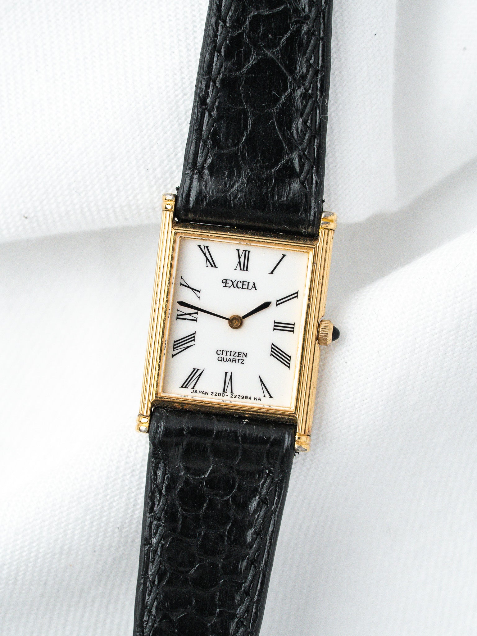 Citizen Excela vintage watch with gold case, white dial, Roman numerals, black alligator strap