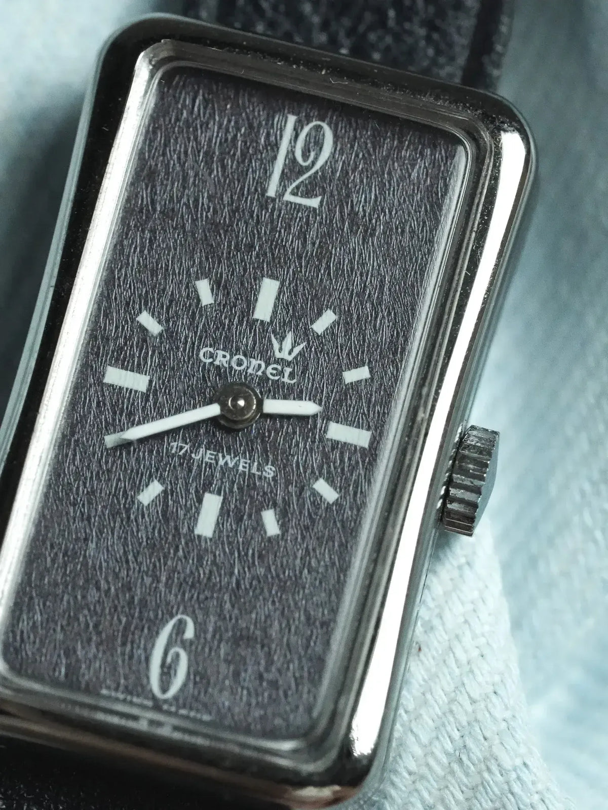 Cronel vintage watch with textured black dial, white markers, and rectangular case