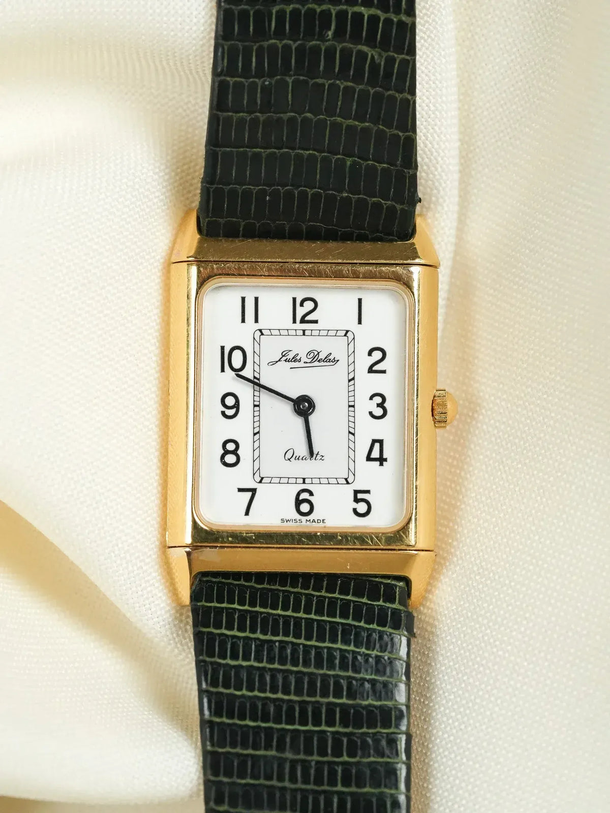 Jules Delas vintage quartz watch, gold case, white dial, black leather strap