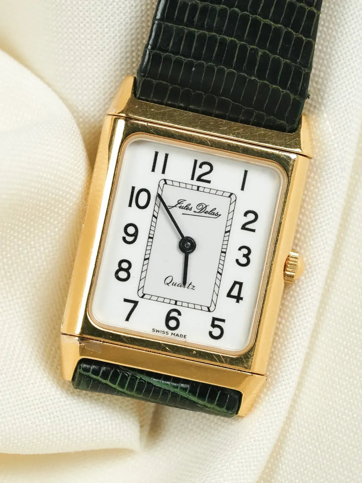 Jules Delas vintage quartz watch, gold case, white dial, black leather strap