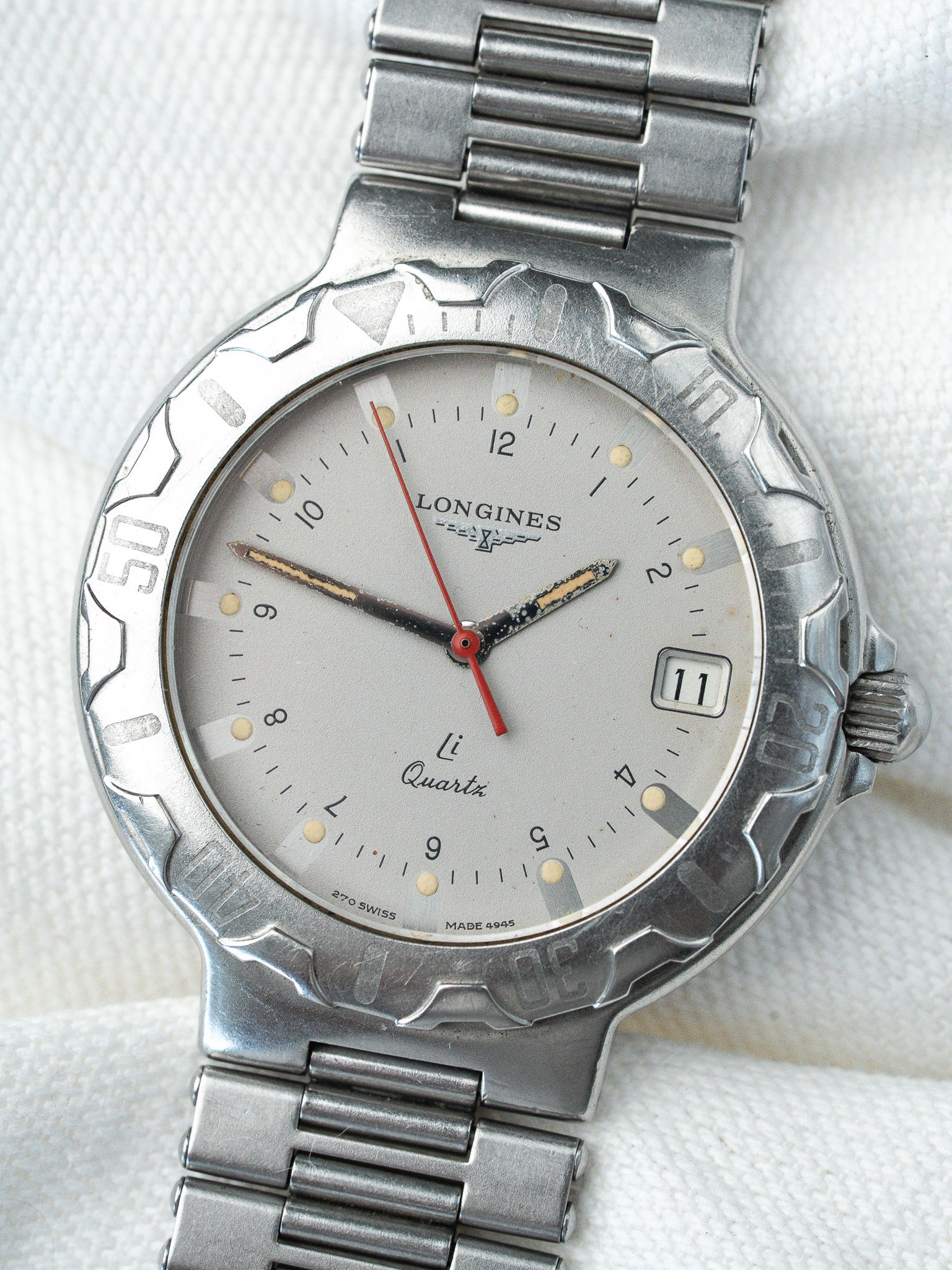 Montre Longines Conquest Vintage - Acier Li-Quartz Trotteuse Rouge (1980) - Atelier Victor