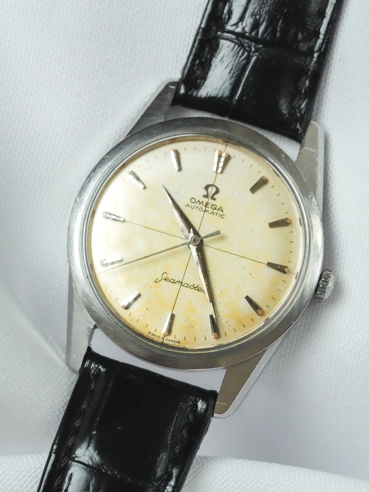 Vintage Omega Seamaster automatic watch with cream dial and black leather strap