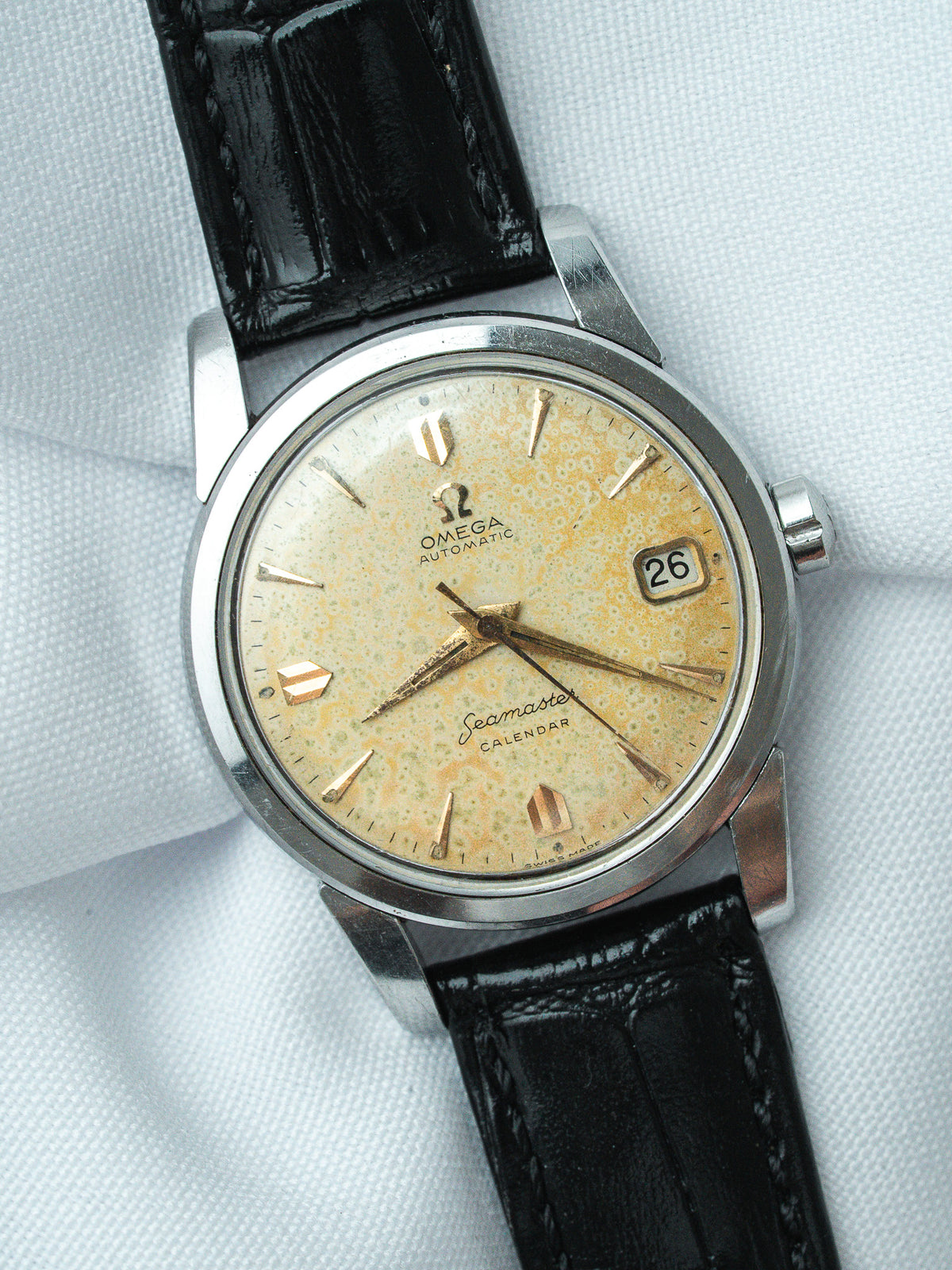 Vintage Omega Seamaster Calendar watch with cream dial, gold markers, black leather strap
