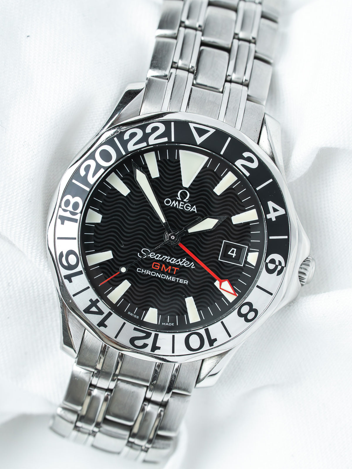 Omega Seamaster GMT Chronometer watch with black dial and steel bracelet