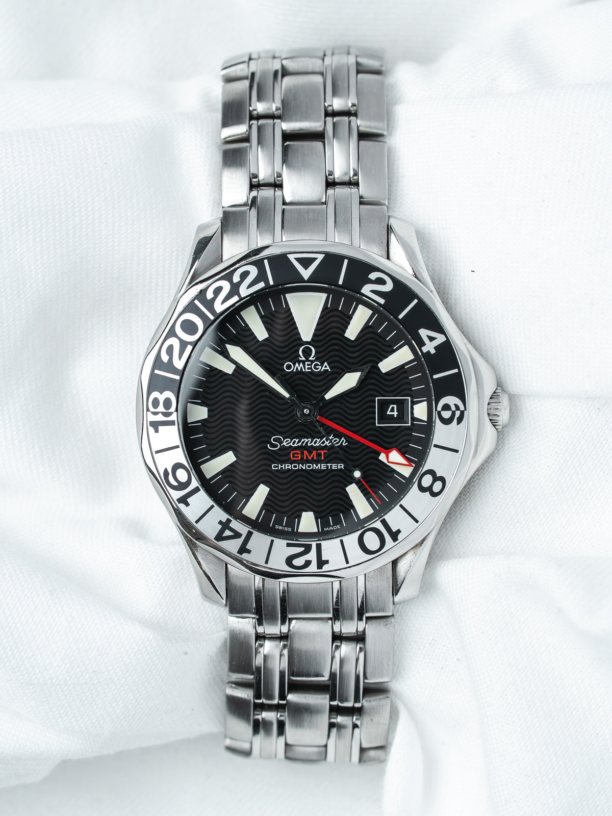 Omega Seamaster GMT Chronometer watch with black dial and steel bracelet