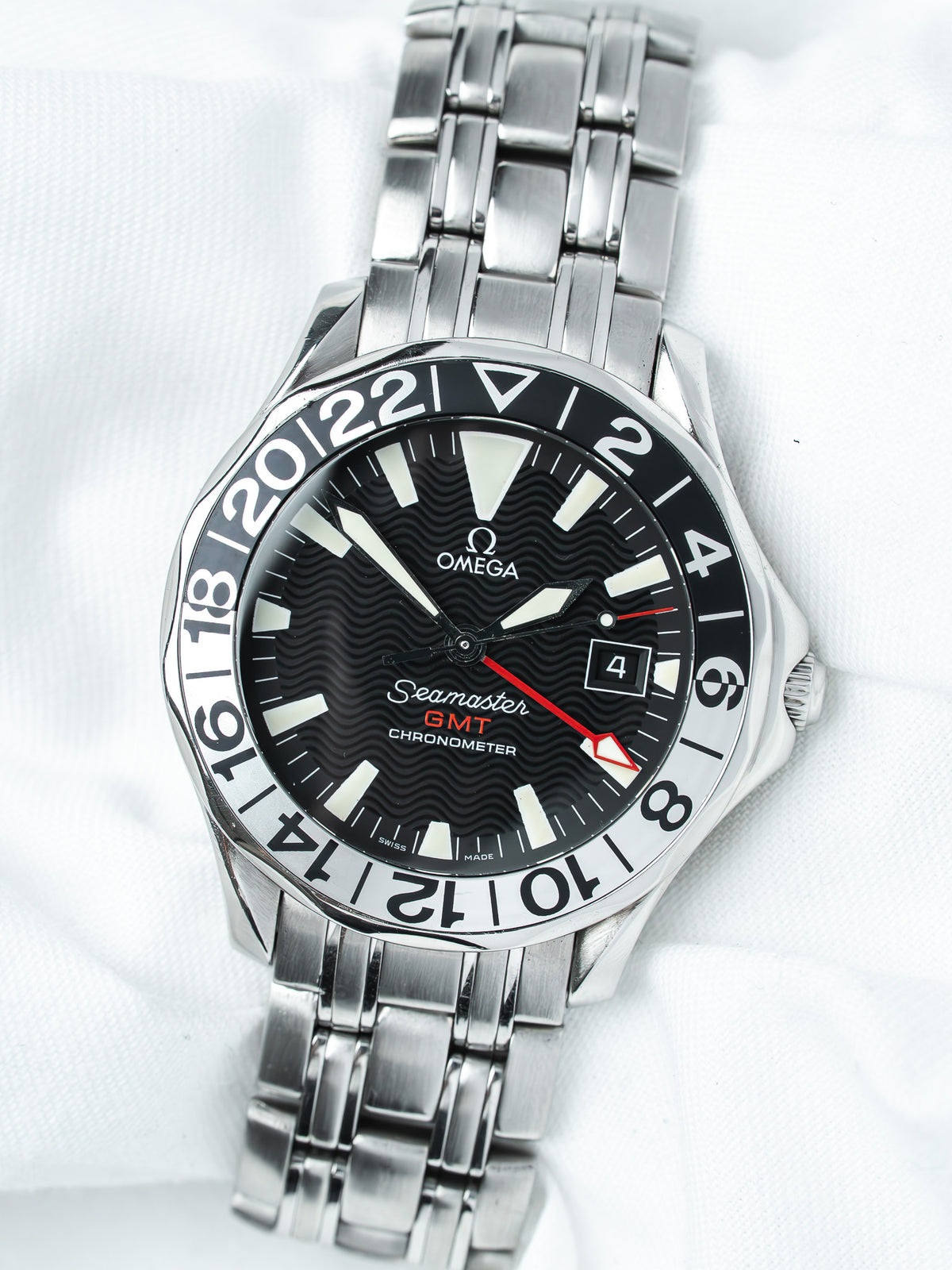 Omega Seamaster GMT Chronometer watch with black dial and stainless steel bracelet