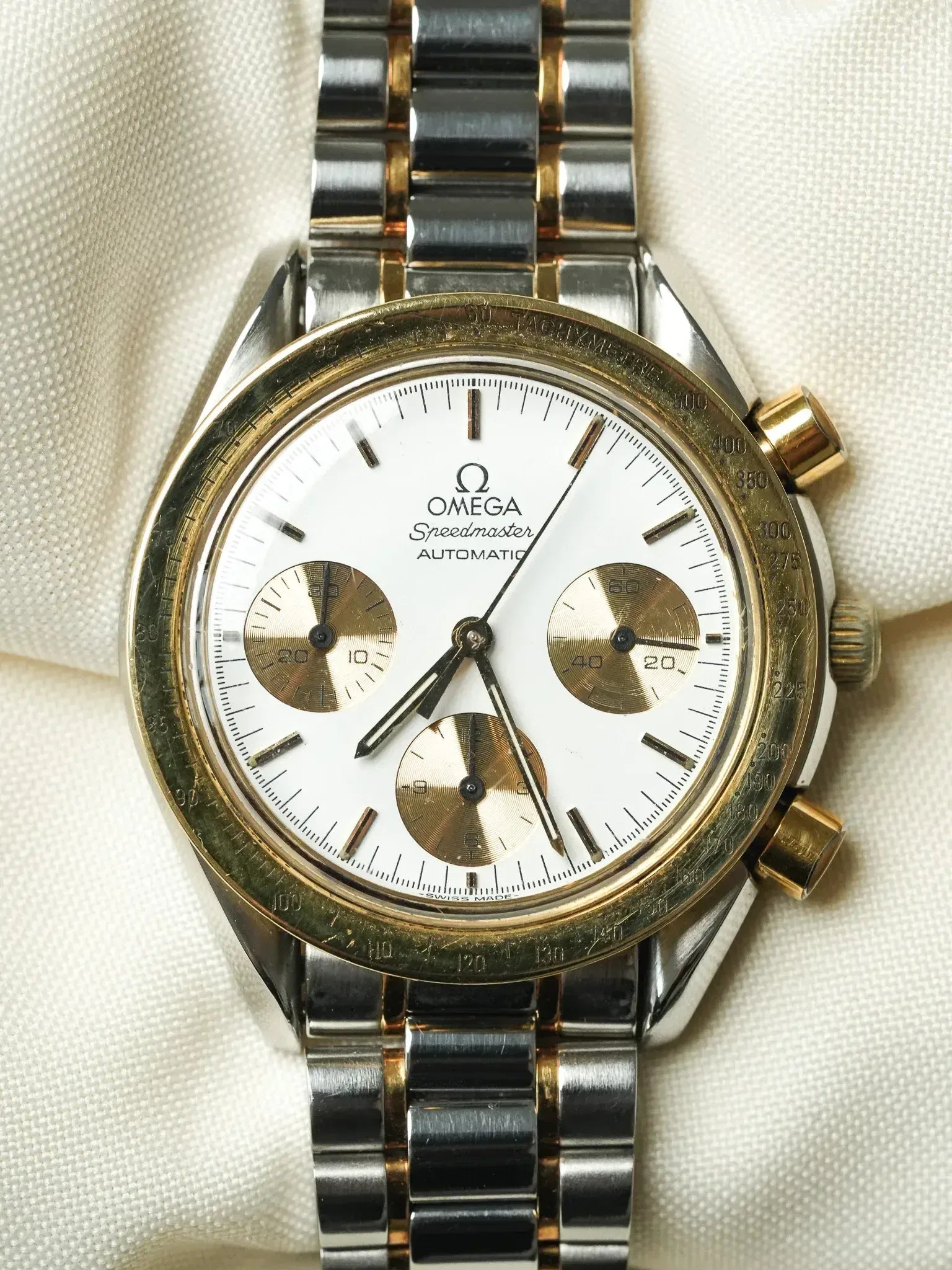 Montre Omega Speedmaster Reduced 175.0033 - Or Acier Cadran blanc (Vintage 1989) - Atelier Victor