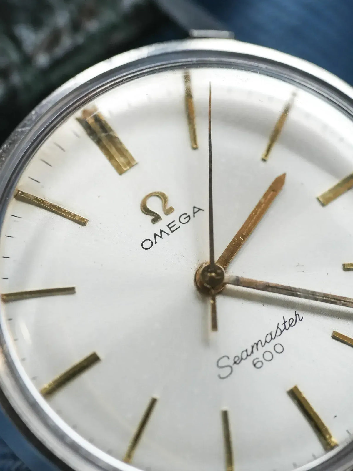 Omega Seamaster 600 vintage watch with white dial and gold markers