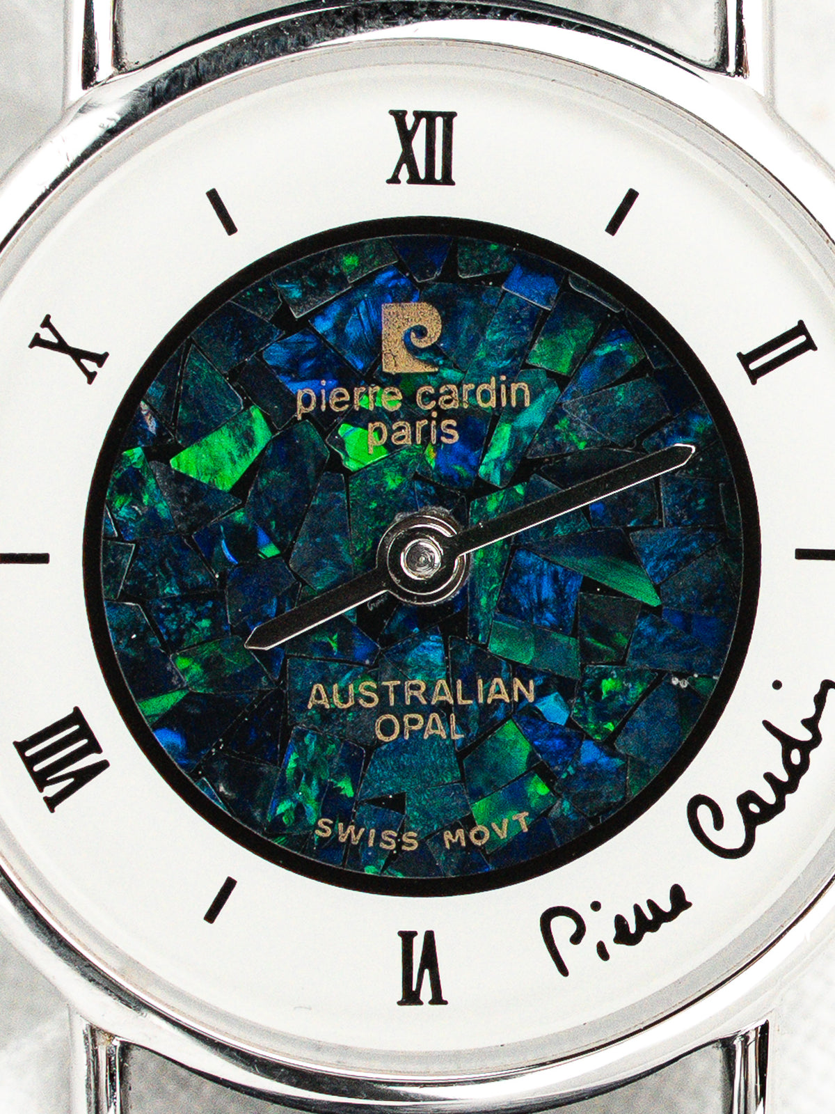 Montre Pierre Cardin avec un cadran en mosaïque d'opale australienne bleue et verte.