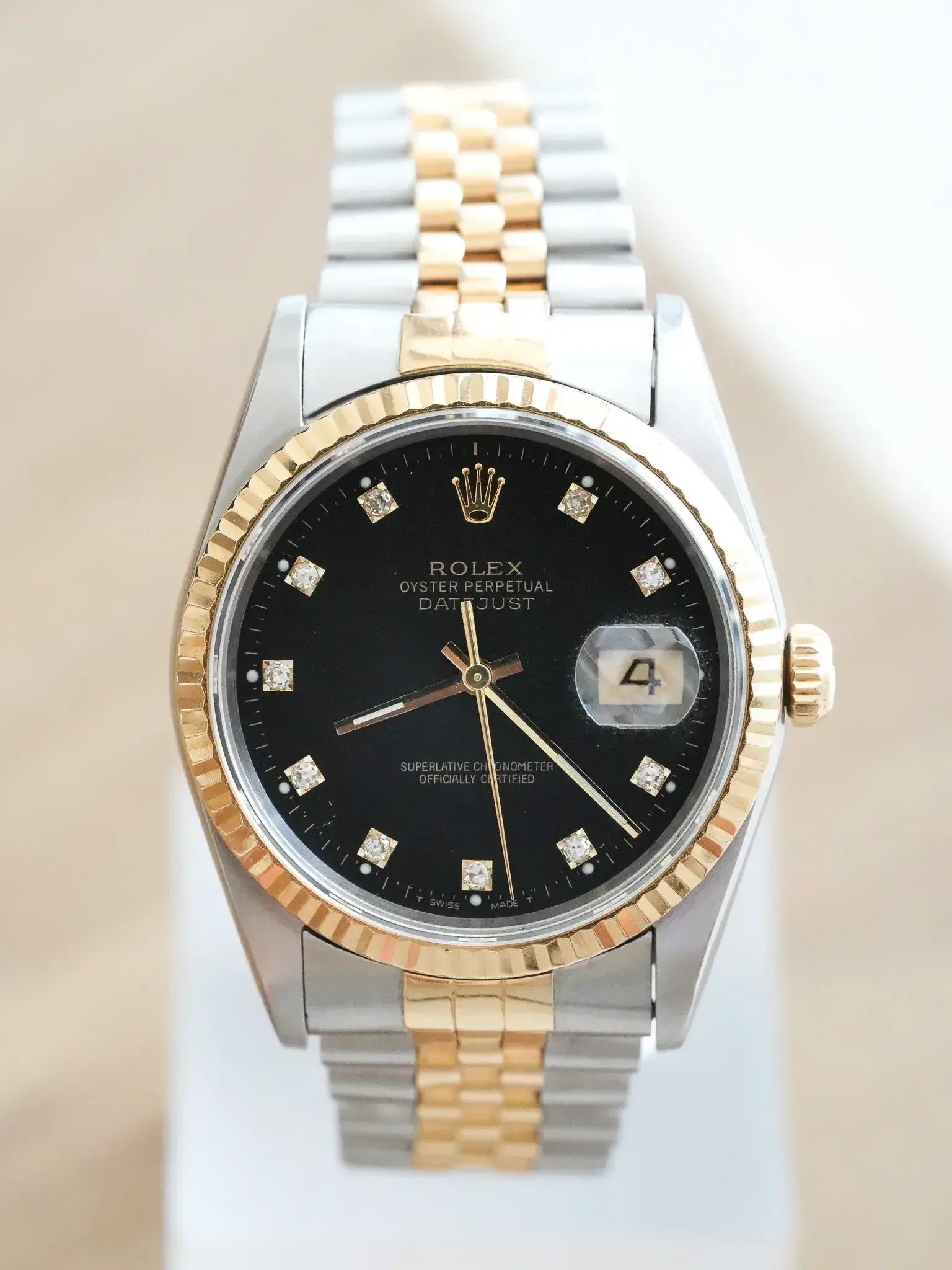 Rolex Datejust vintage two-tone with black diamond hour markers and fluted bezel