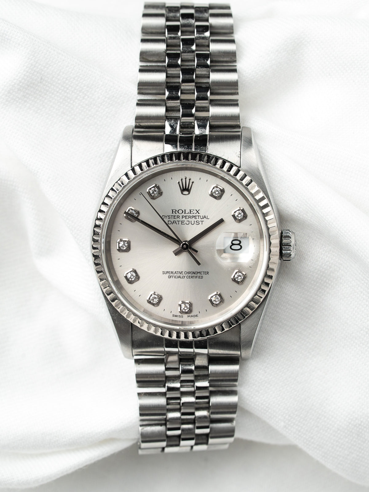 Front view on white linen - Vintage Rolex Datejust Watch 16234 - Atelier Victor