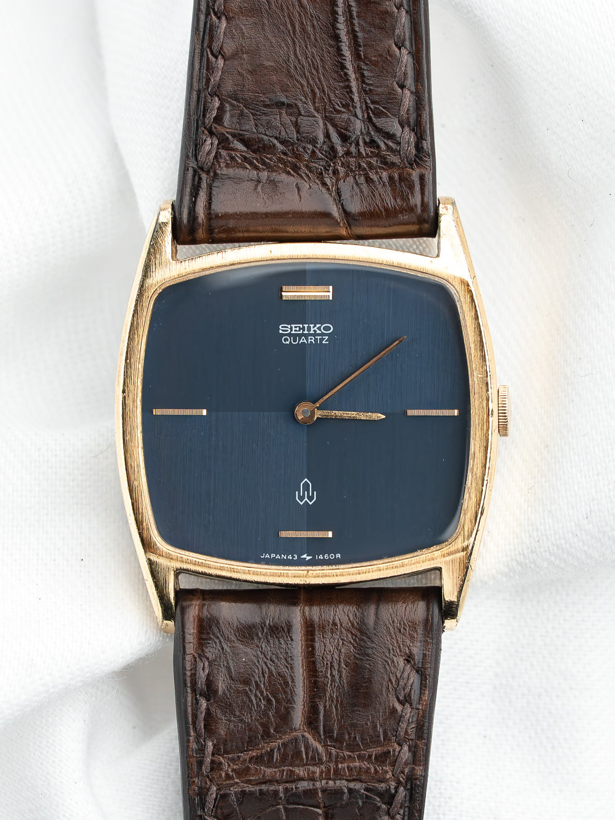 Montre Seiko Quartz vintage au cadran bleu et bracelet en cuir marron