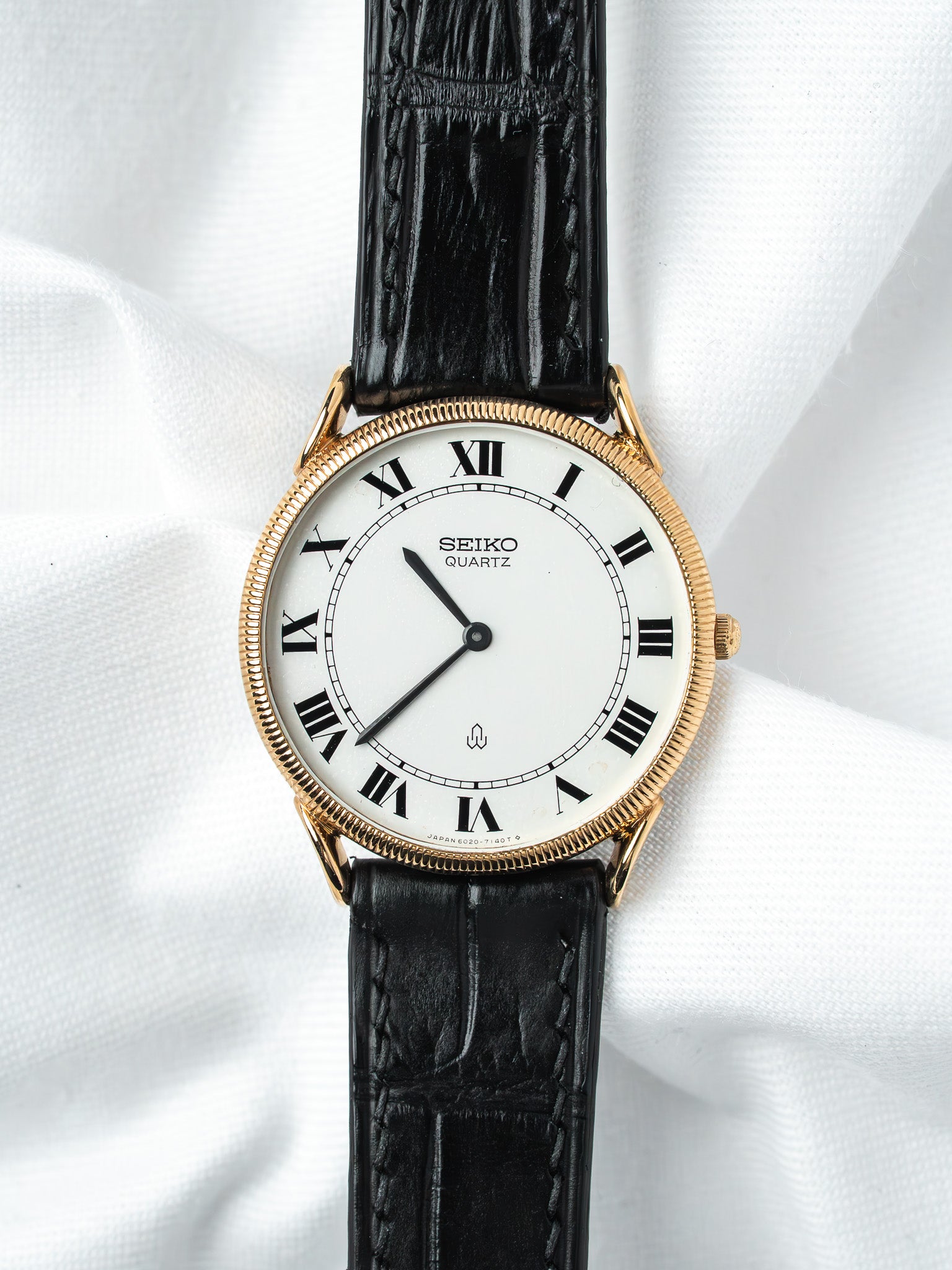 Montre Seiko 8020-7080 Plaqué Or — Cornes de Vache Guillochée (1983)