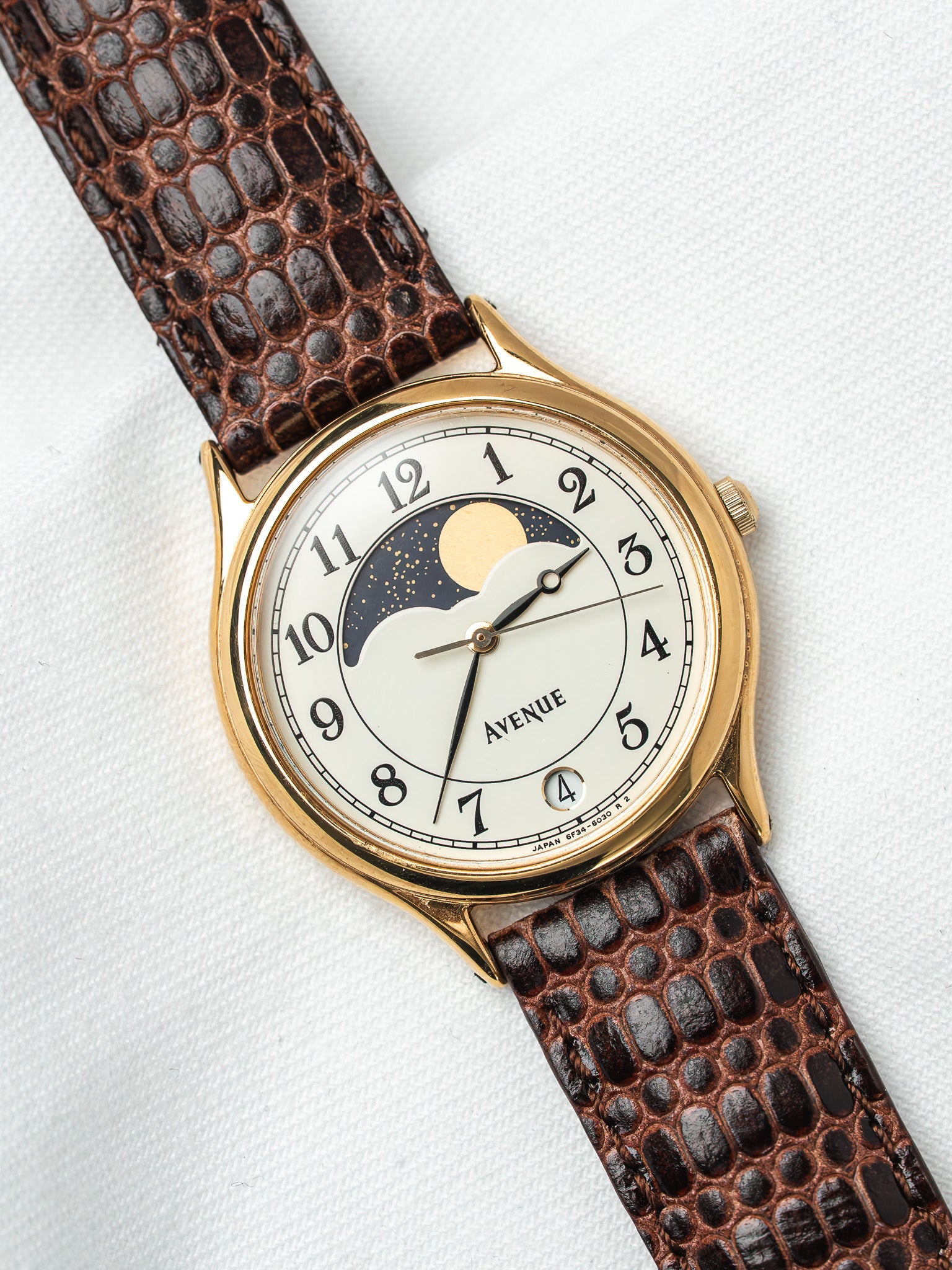 Avenue vintage watch with gold case, white dial, moon phase, brown crocodile strap