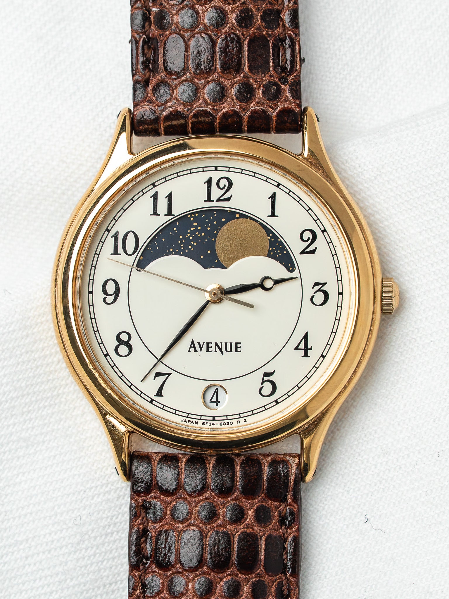 Avenue vintage watch with gold case, white dial, moon phase, brown lizard strap