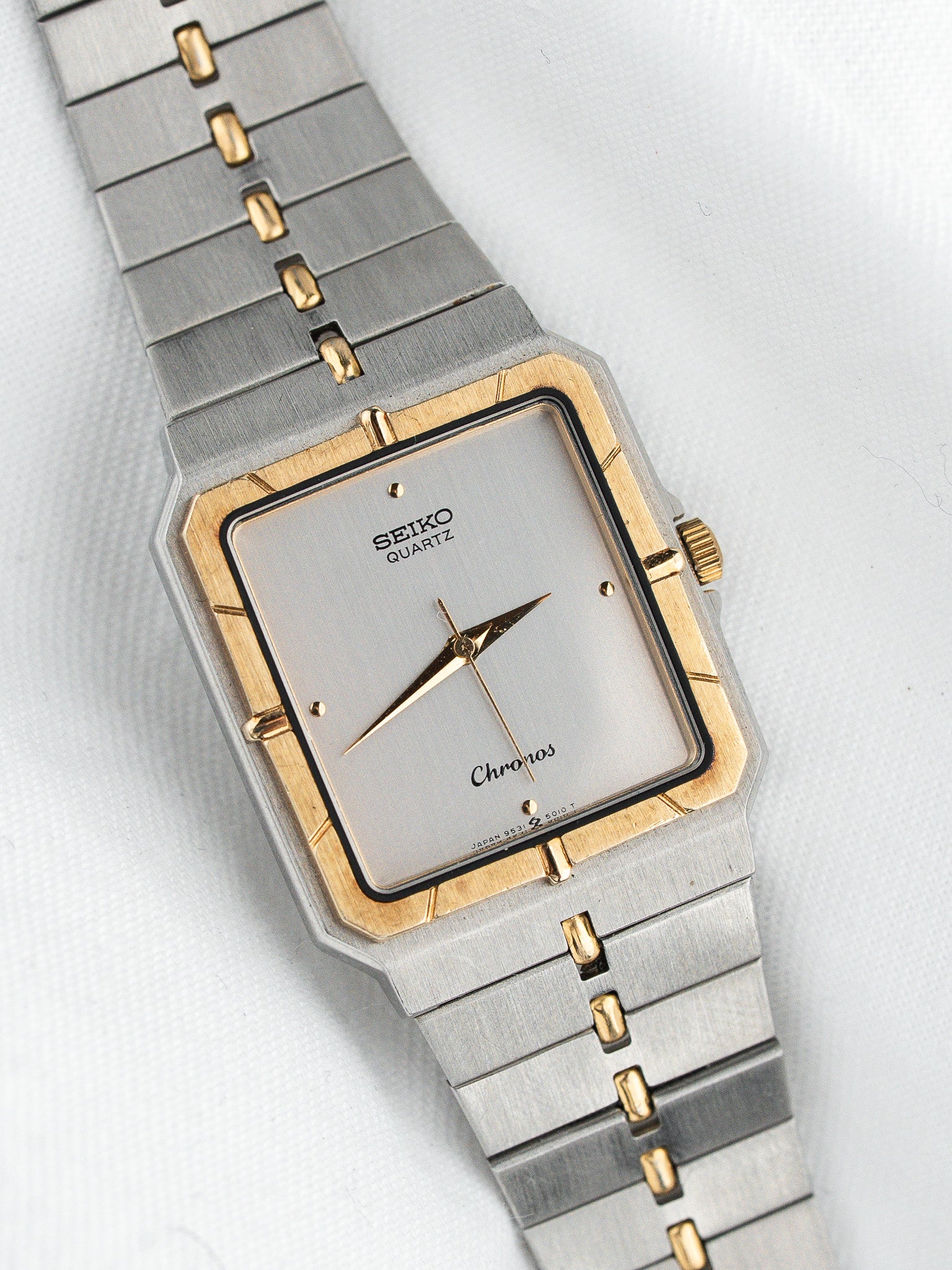 Seiko Chronos vintage quartz watch with silver dial and gold accents