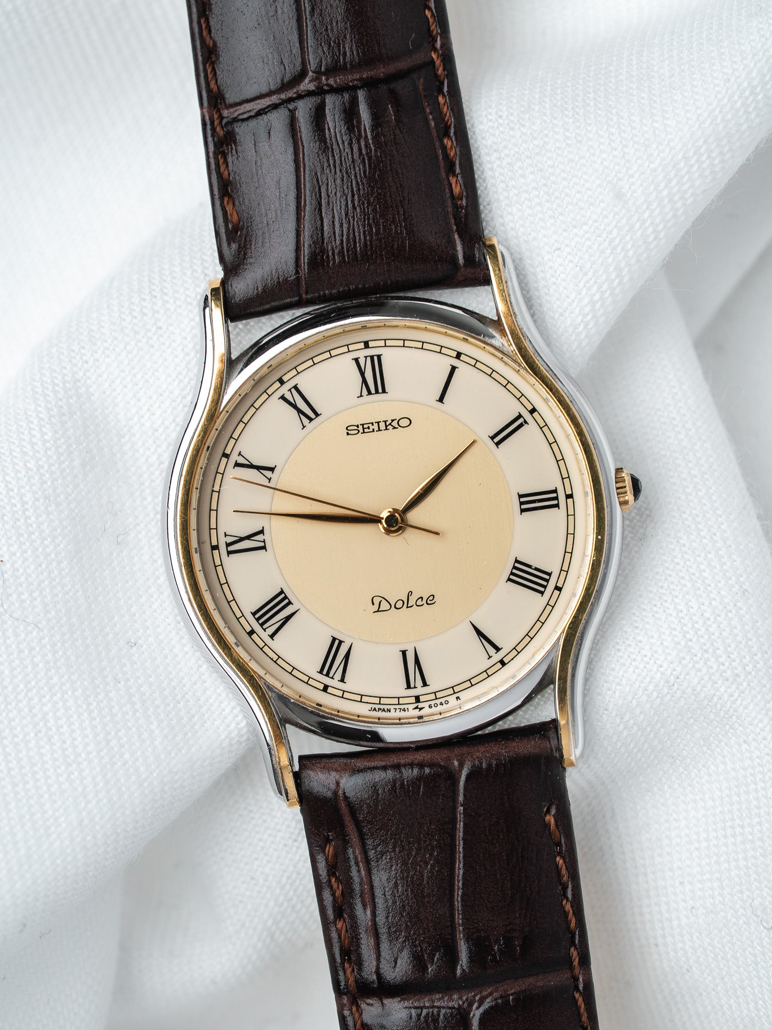 Seiko Dolce vintage watch with cream dial, Roman numerals, brown leather strap
