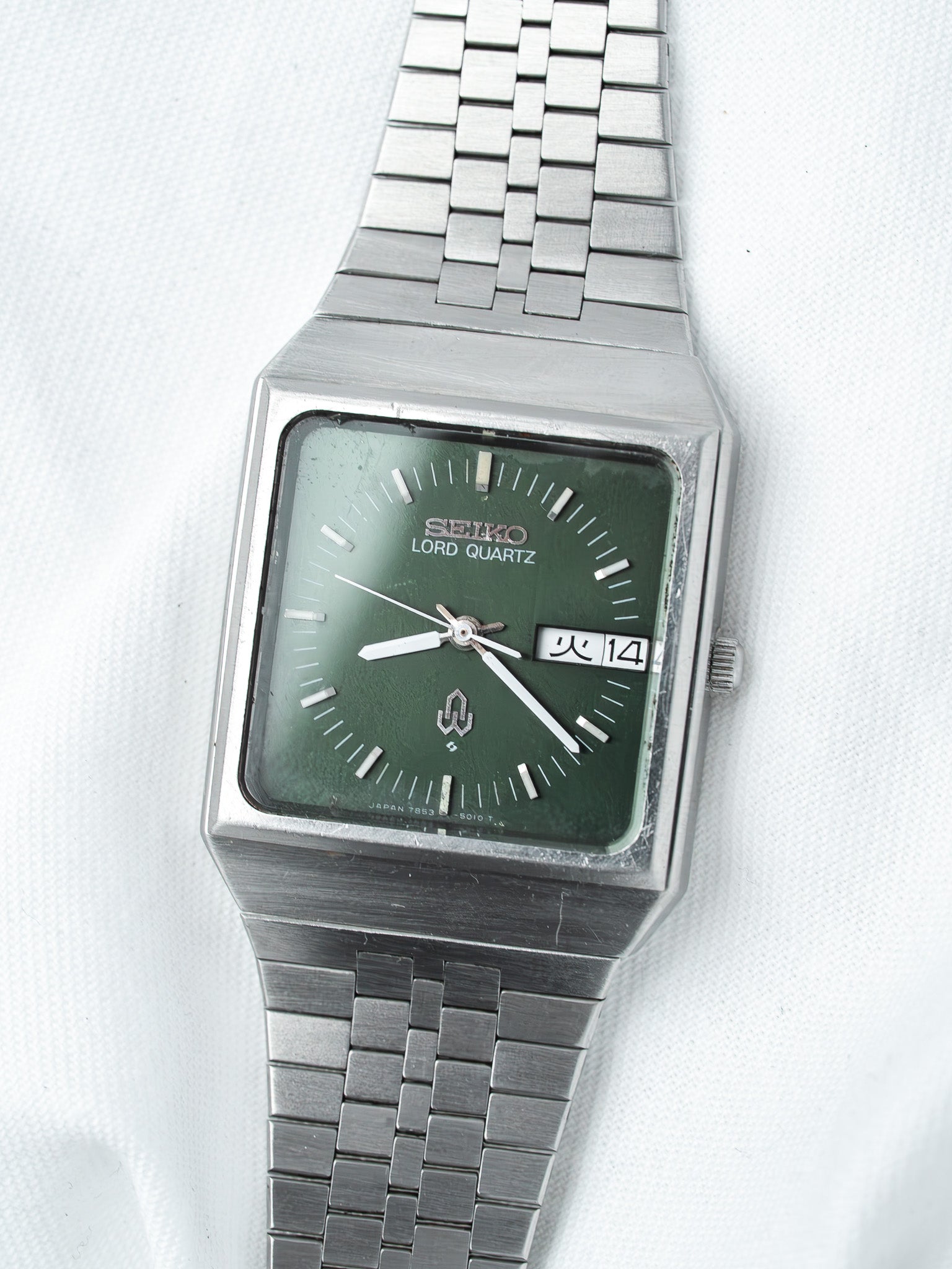 Seiko Lord Quartz vintage watch with green dial and steel bracelet