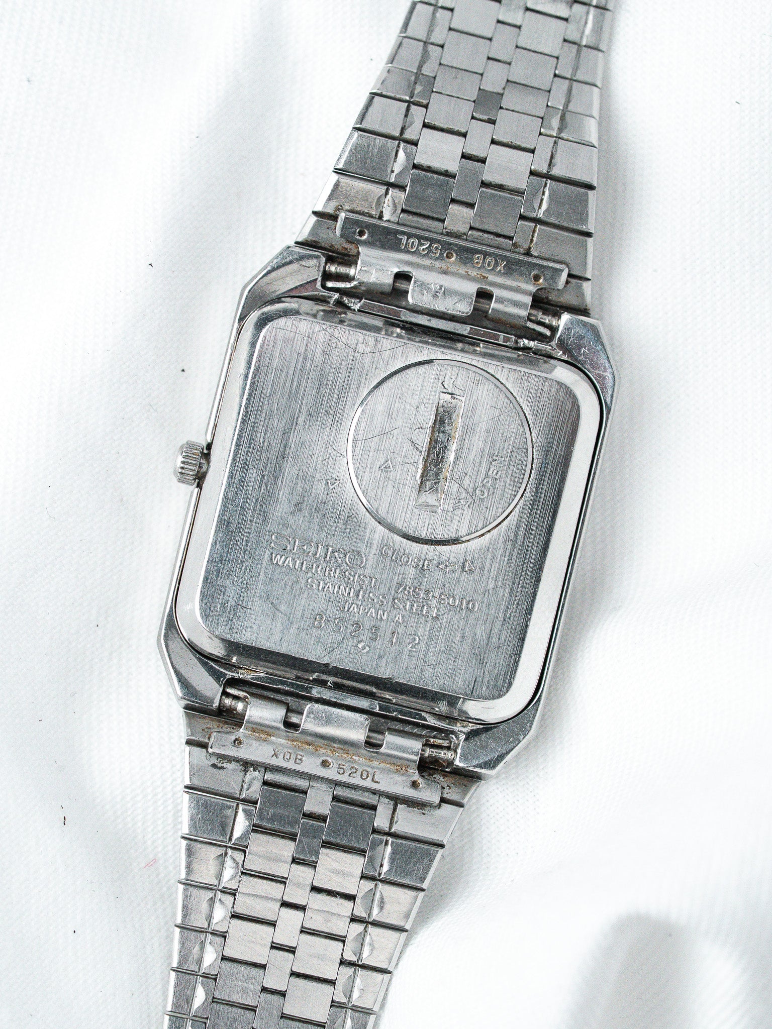 Seiko vintage watch with stainless steel case and bracelet, back view