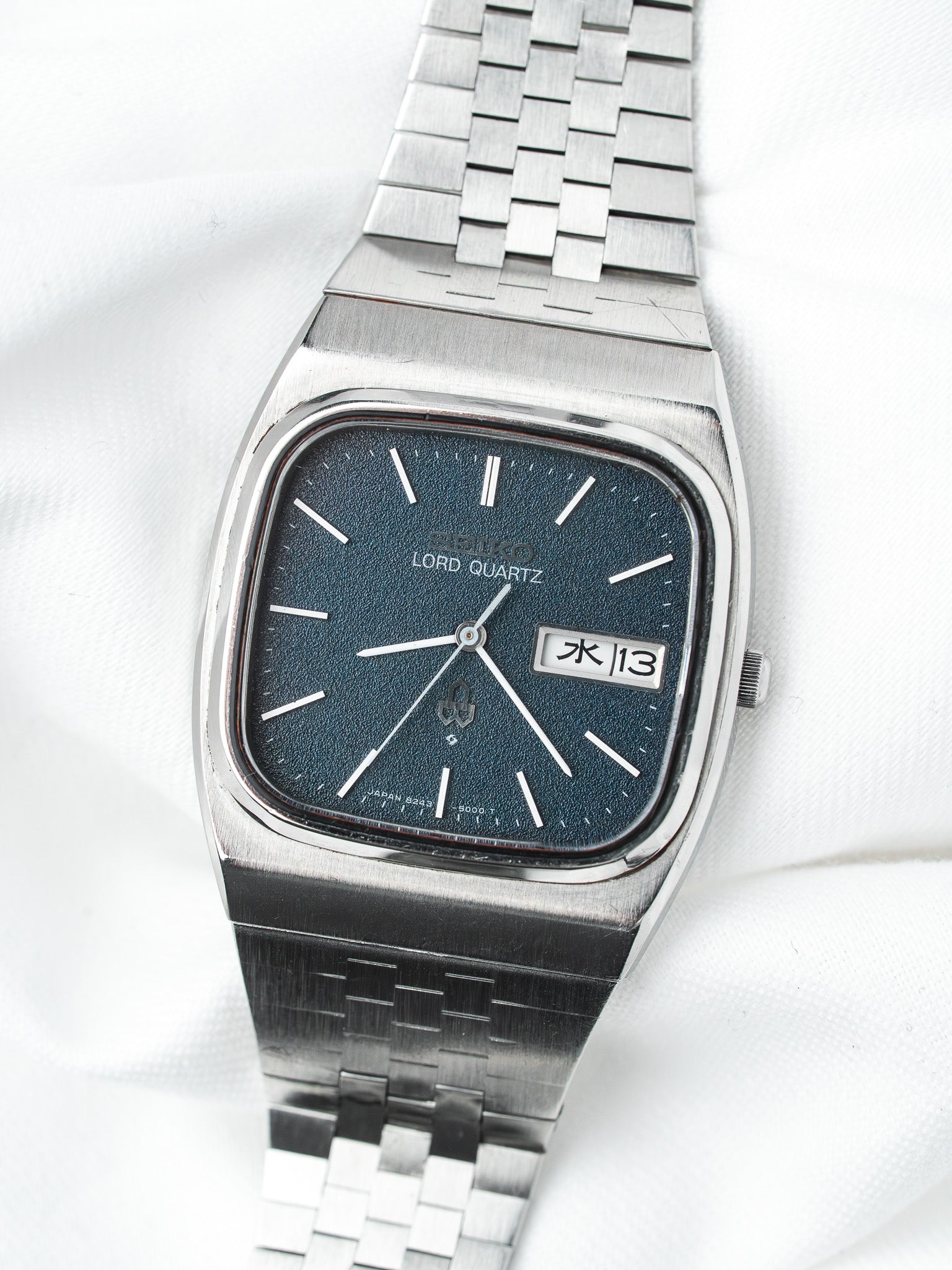 Seiko Lord Quartz vintage watch with blue dial, steel case and bracelet, day-date display