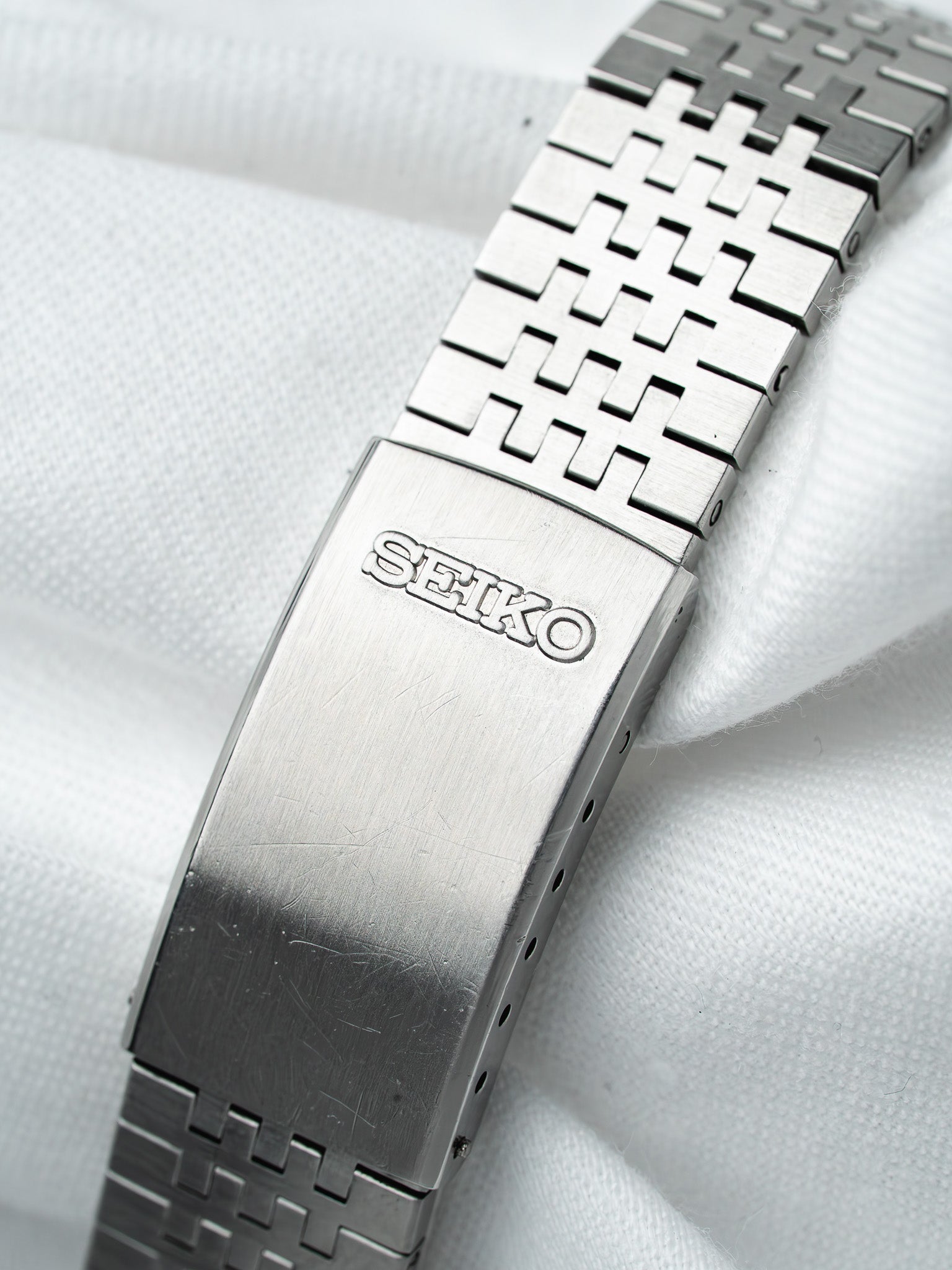 Seiko vintage watch bracelet with engraved logo, stainless steel mesh design