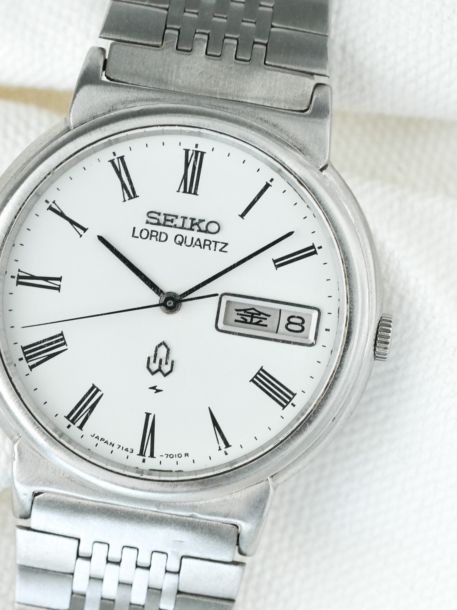 Montre Seiko Lord Quartz Vintage - Daydate Kanji Acier Romain (1979) - Atelier Victor