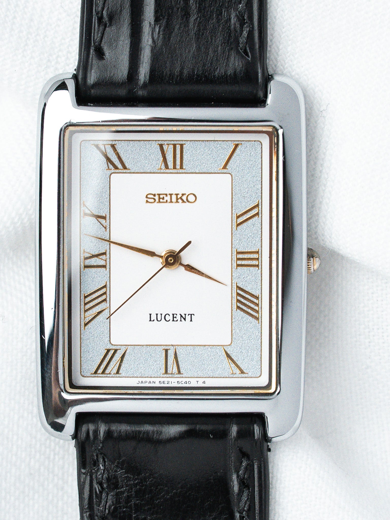 Seiko Lucent vintage watch with rectangular case, Roman numerals, black leather strap