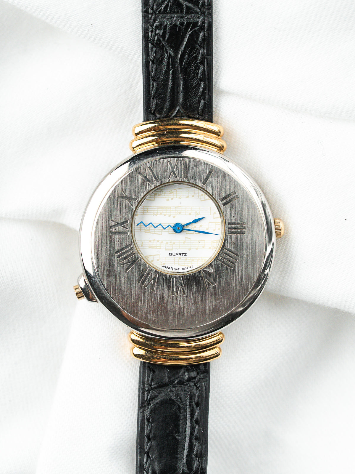 ساعة Seiko Mélodie V421-0040 — ميناء نوتة موسيقية بعقارب Éclair (1990) 