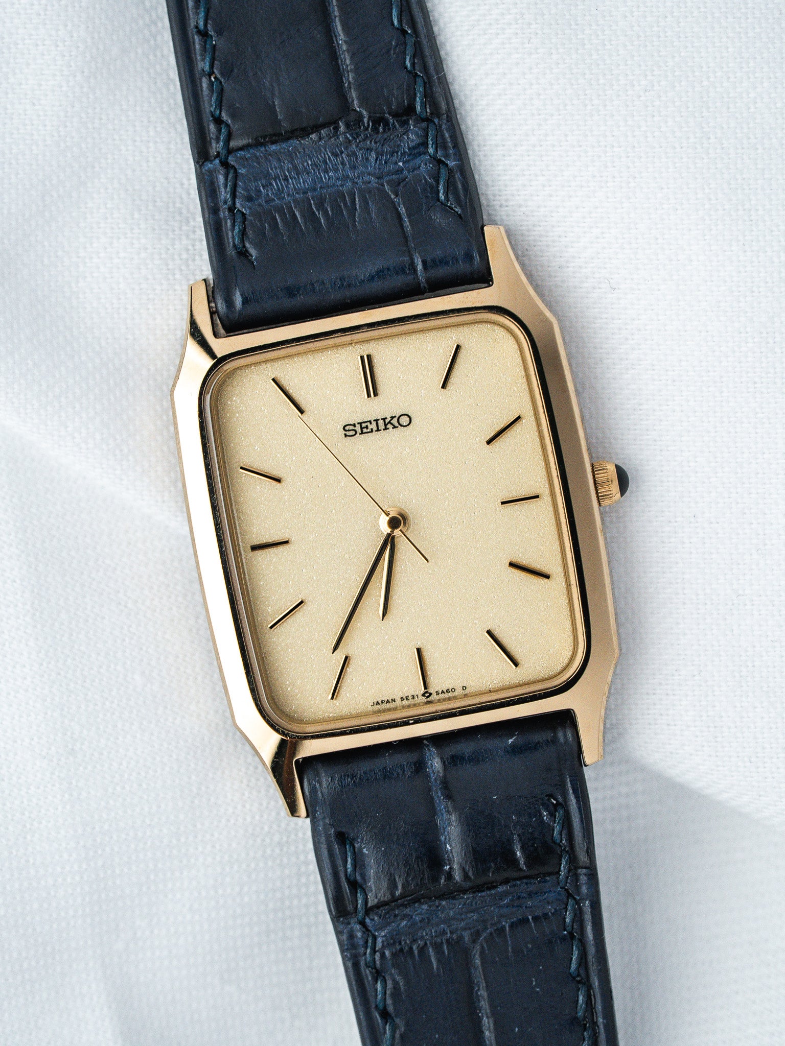 Montre Seiko Tank 5E21-5A50 Plaqué Or — Cadran Doré Sablé (1990)
