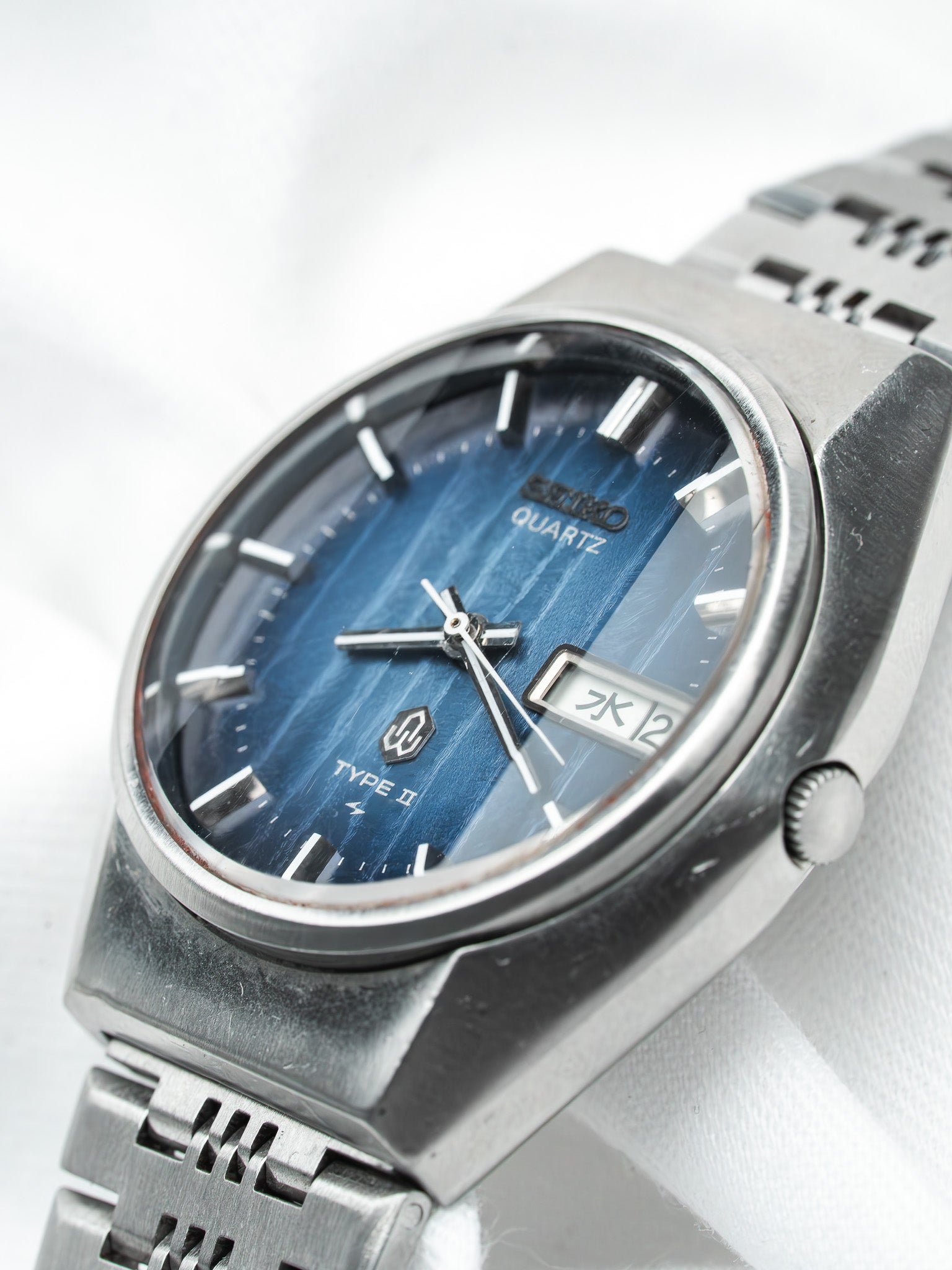 Seiko Quartz Type II vintage watch with blue textured dial and steel bracelet